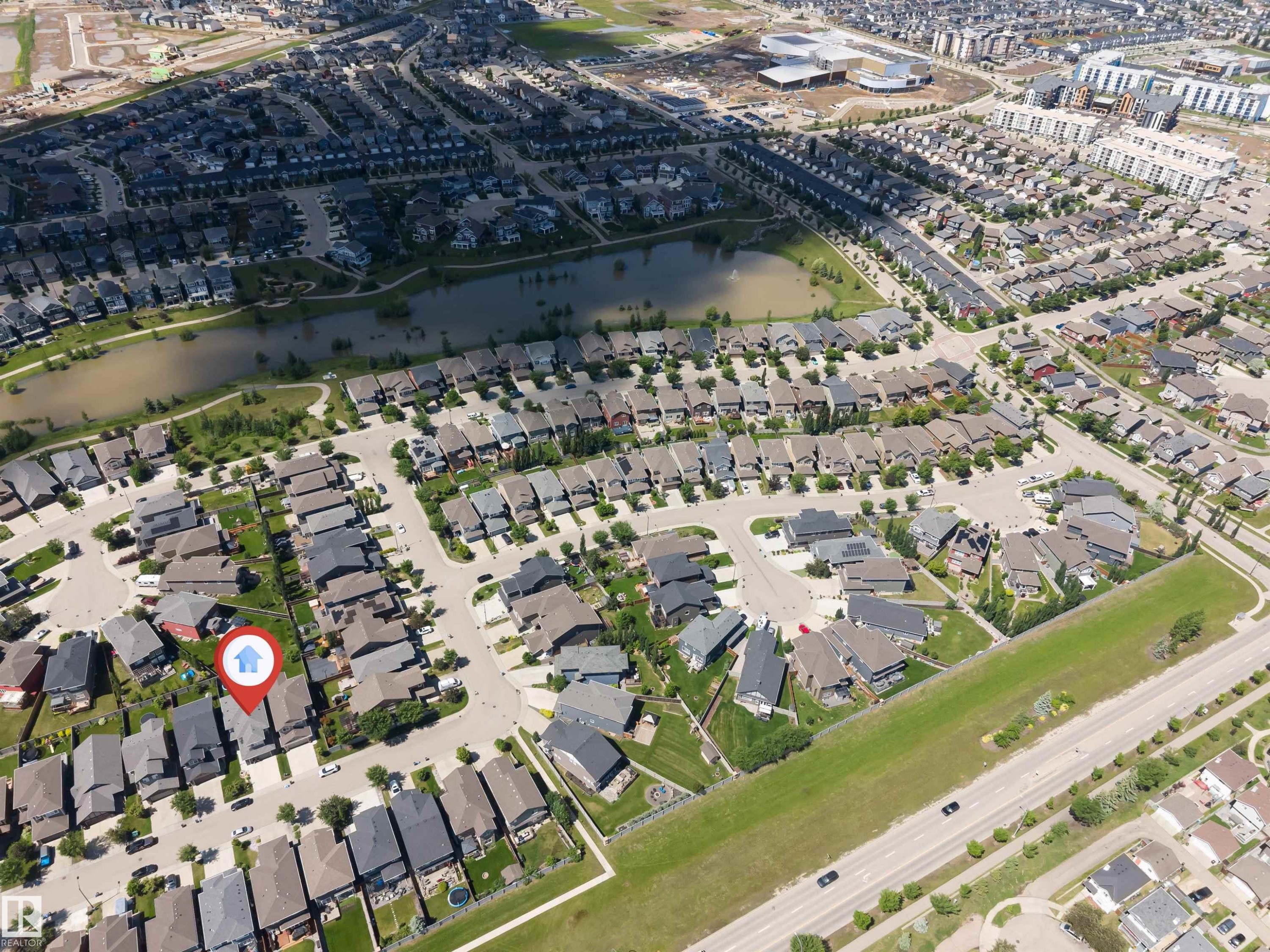 Aerial perspective highlighting a residential property within a developed neighborhood - 8516 216 Street, Edmonton, AB