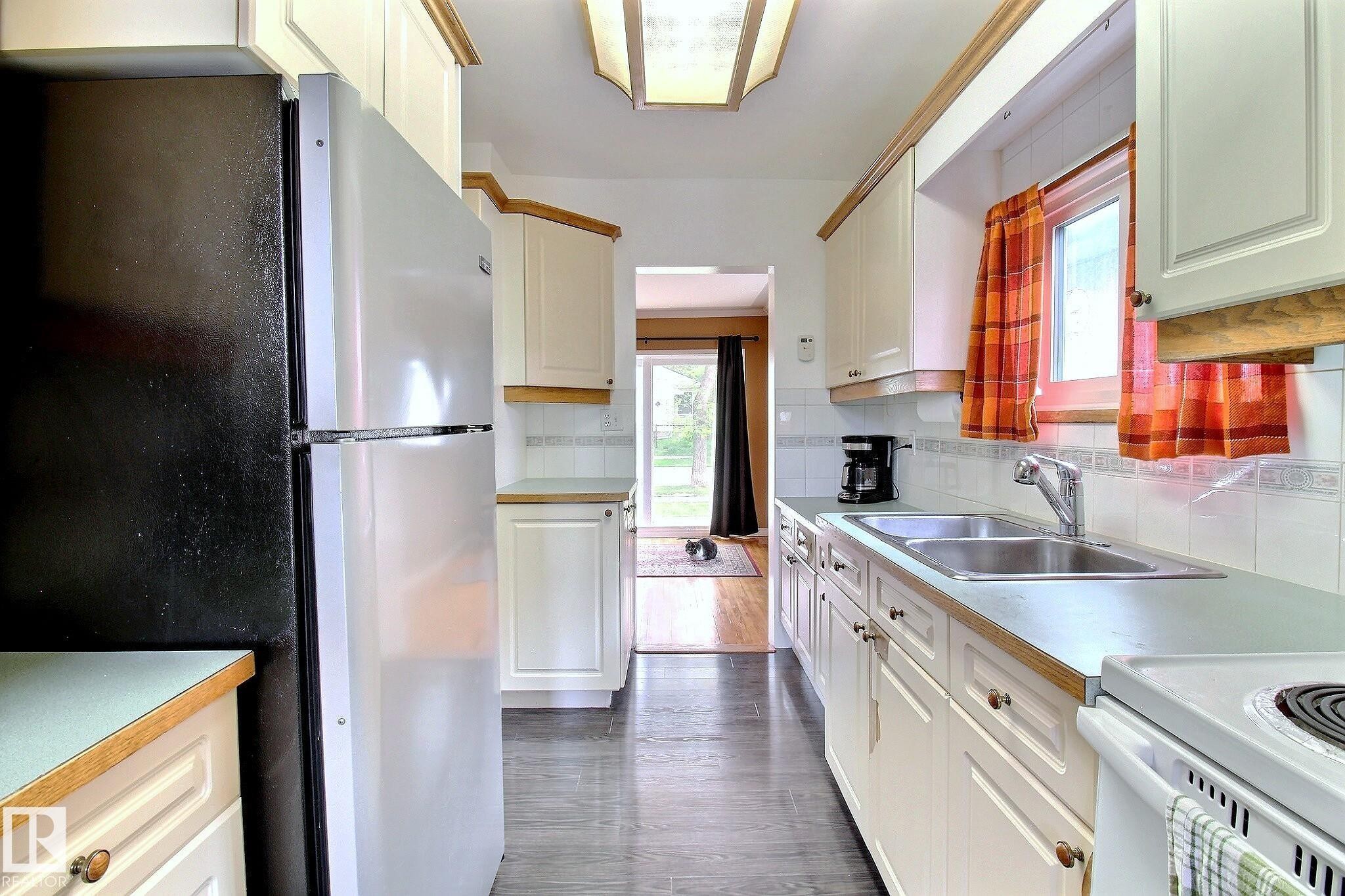11930 95A Street, Edmonton, AB - Indoor Photo Showing Kitchen With Double Sink