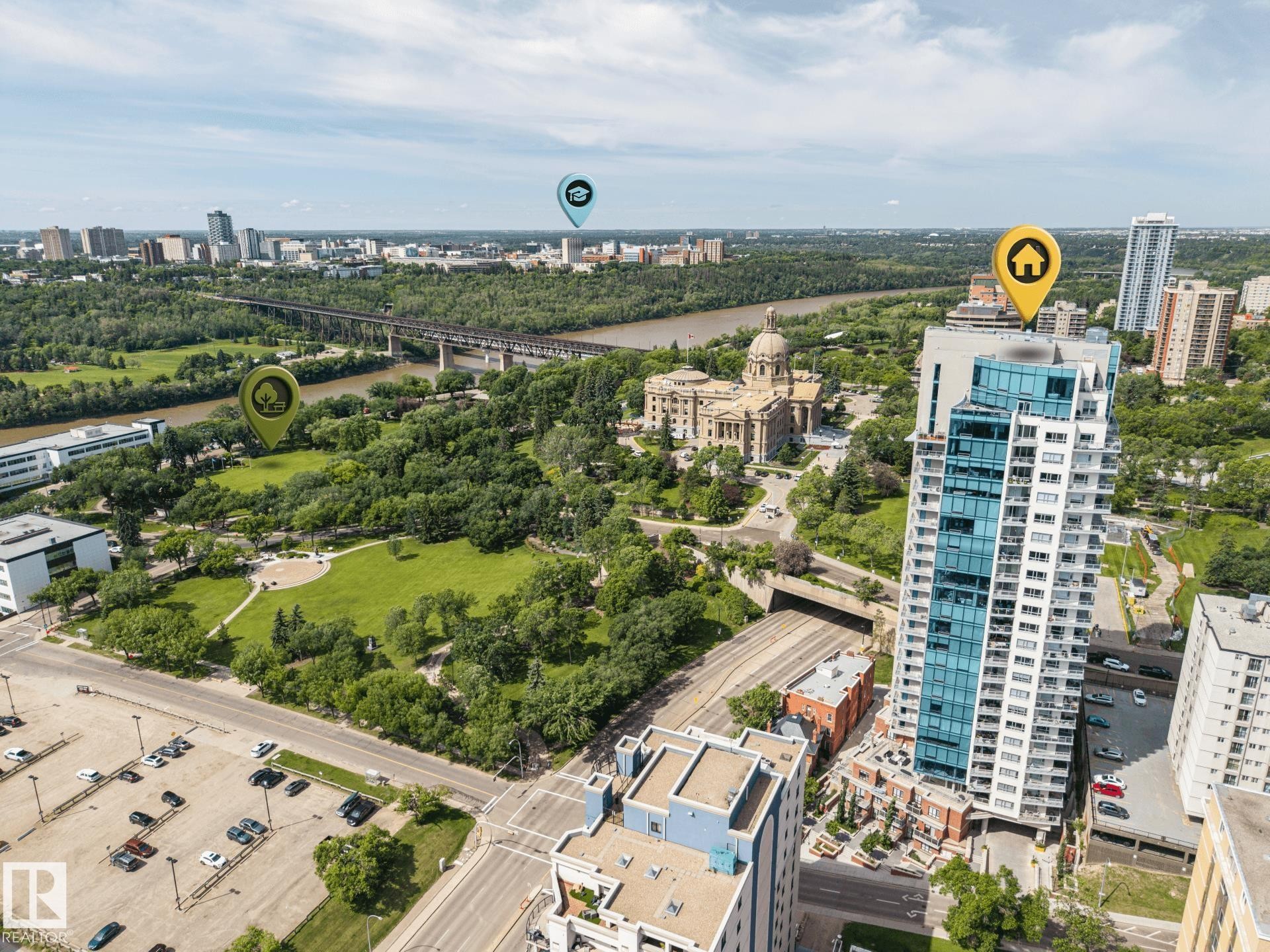 Contemporary high-rise building featuring extensive glass curtain walls and numerous balconies - #802 9720 106 St Nw, Edmonton, AB - Outdoor With View