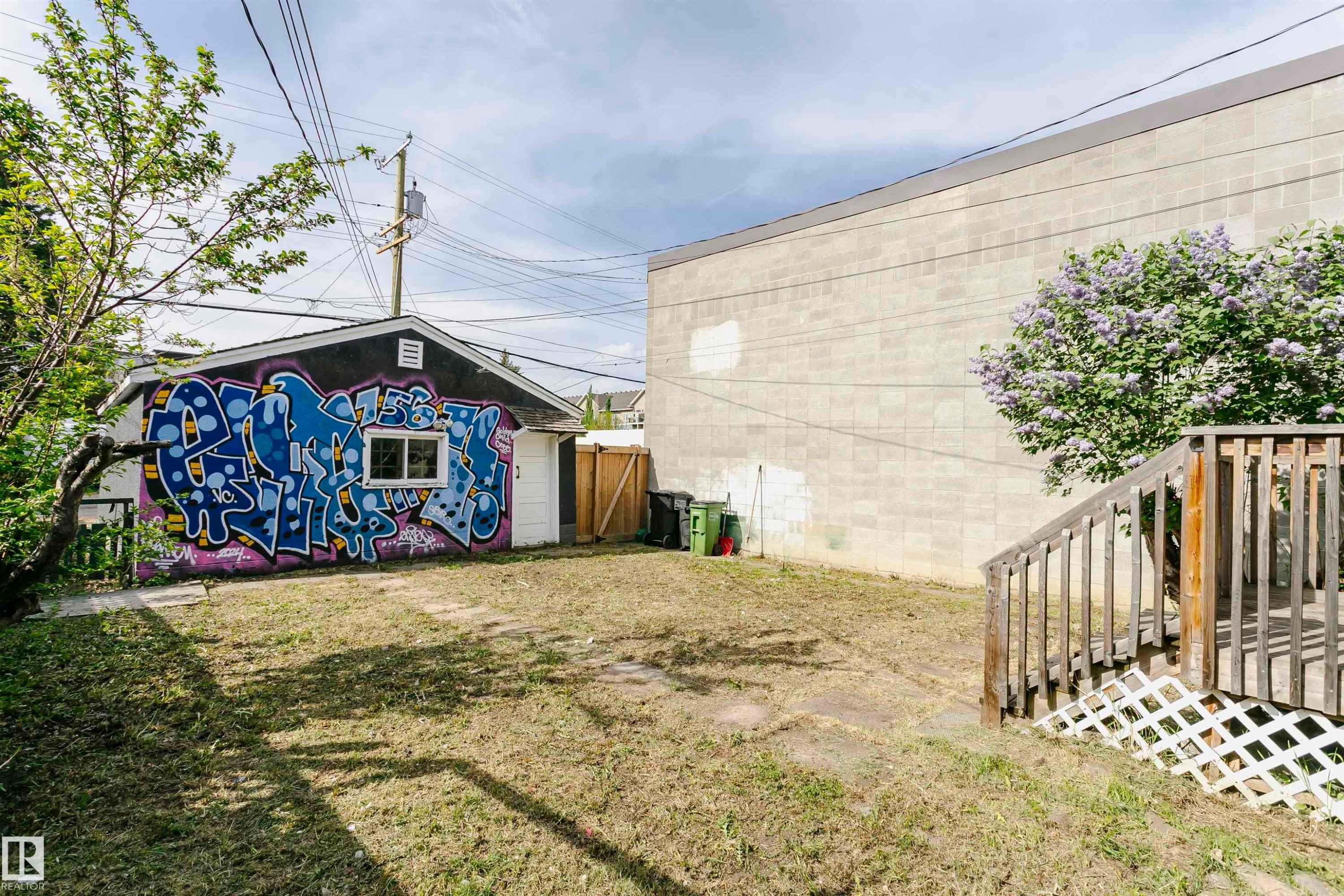 Detached single-story structure with a gabled roof and a side-entry door, featuring a single window - 10035 81 Avenue Nw, Edmonton, AB - Outdoor