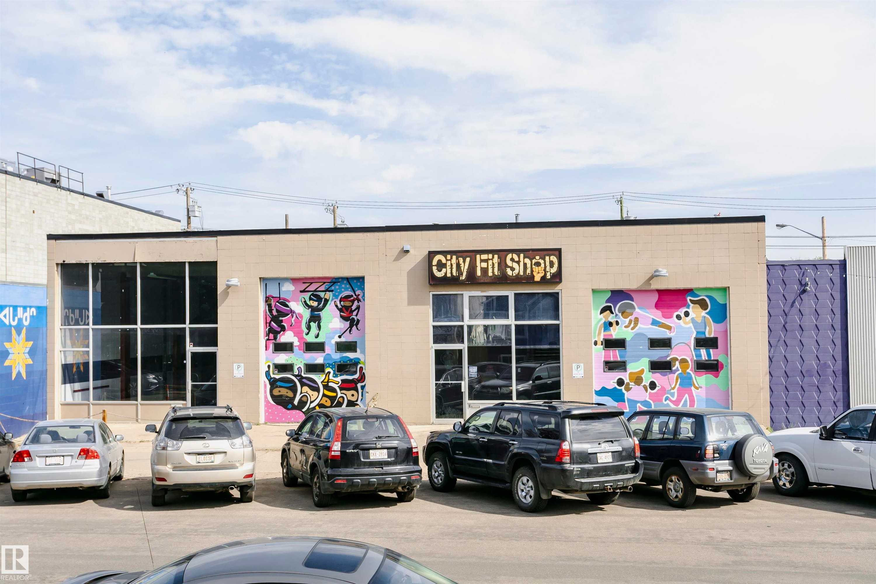 Commercial building featuring a prominent storefront with large windows and a distinct "City Fit Shop" sign - 10035 81 Avenue Nw, Edmonton, AB - Outdoor
