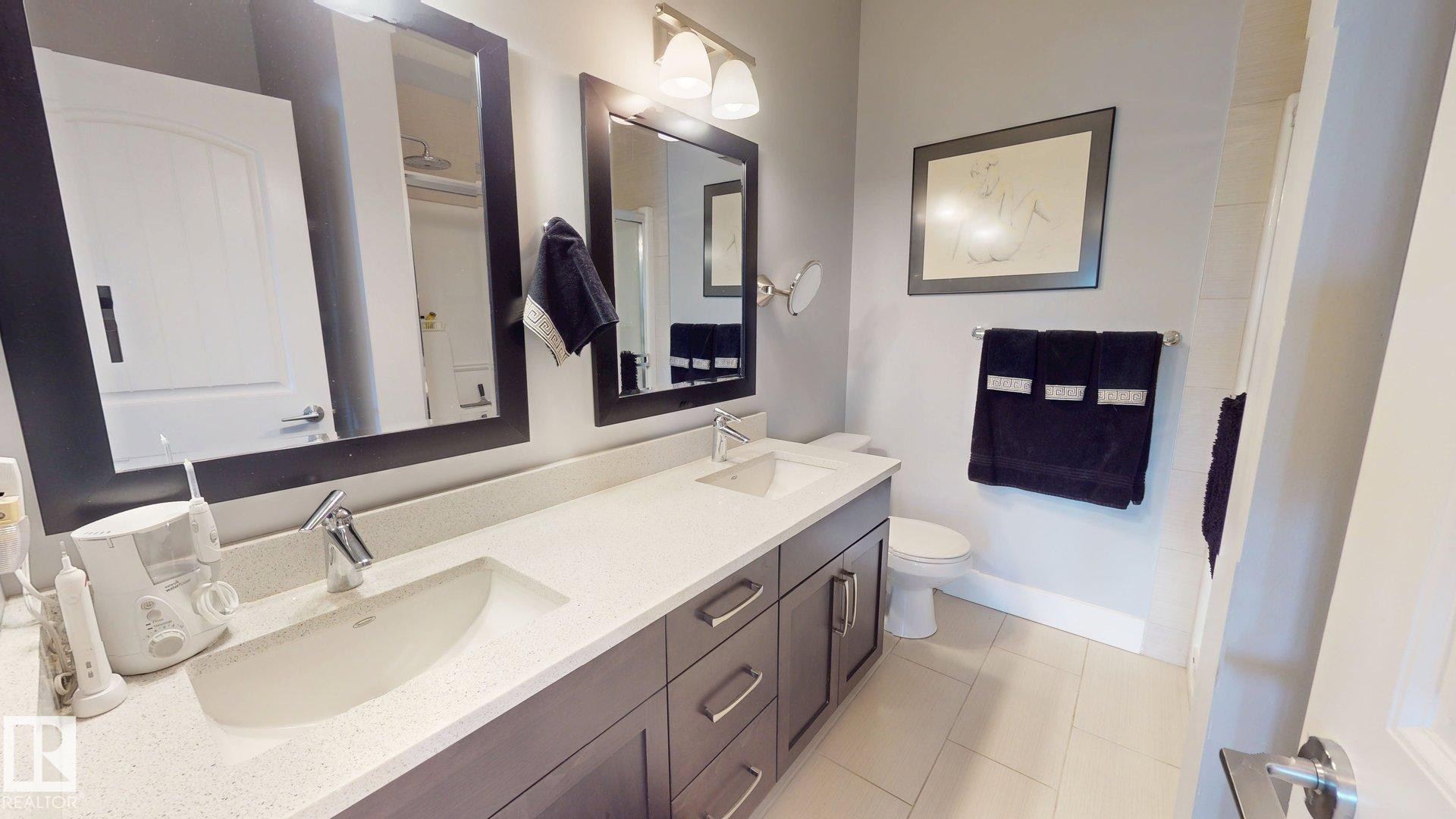 #355 6079 Maynard Wy Nw, Edmonton, AB - Indoor Photo Showing Bathroom