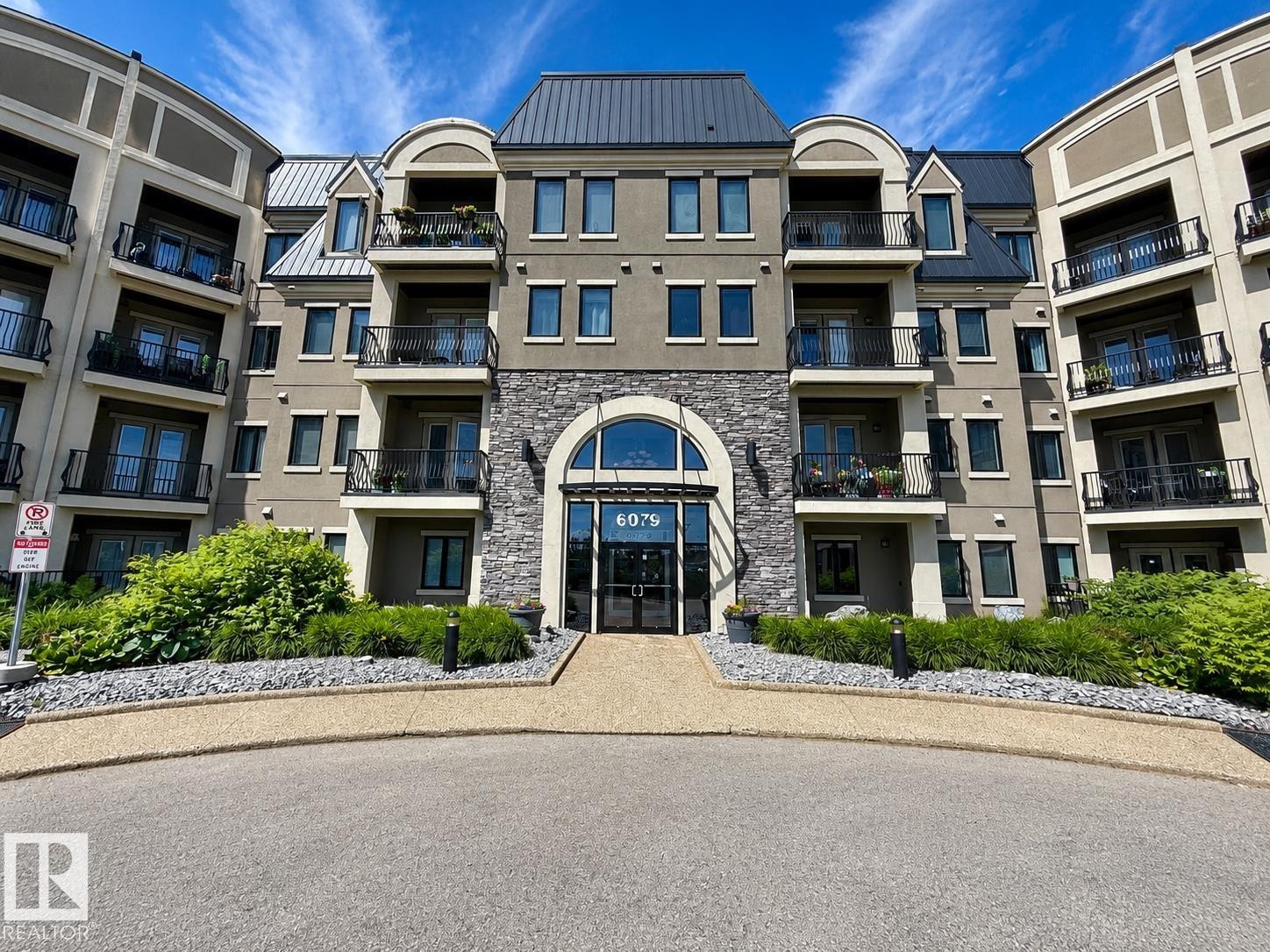 #355 6079 Maynard Wy Nw, Edmonton, AB - Outdoor With Facade