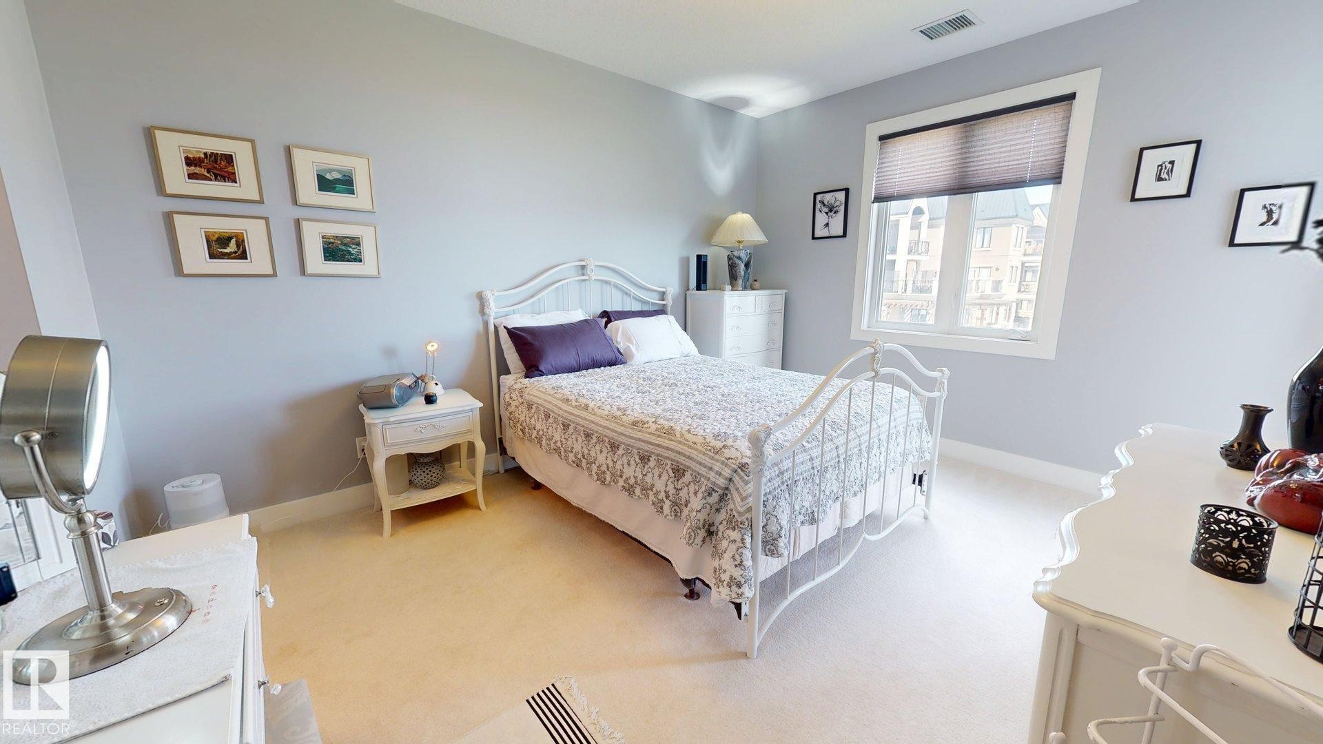 #355 6079 Maynard Wy Nw, Edmonton, AB - Indoor Photo Showing Bedroom