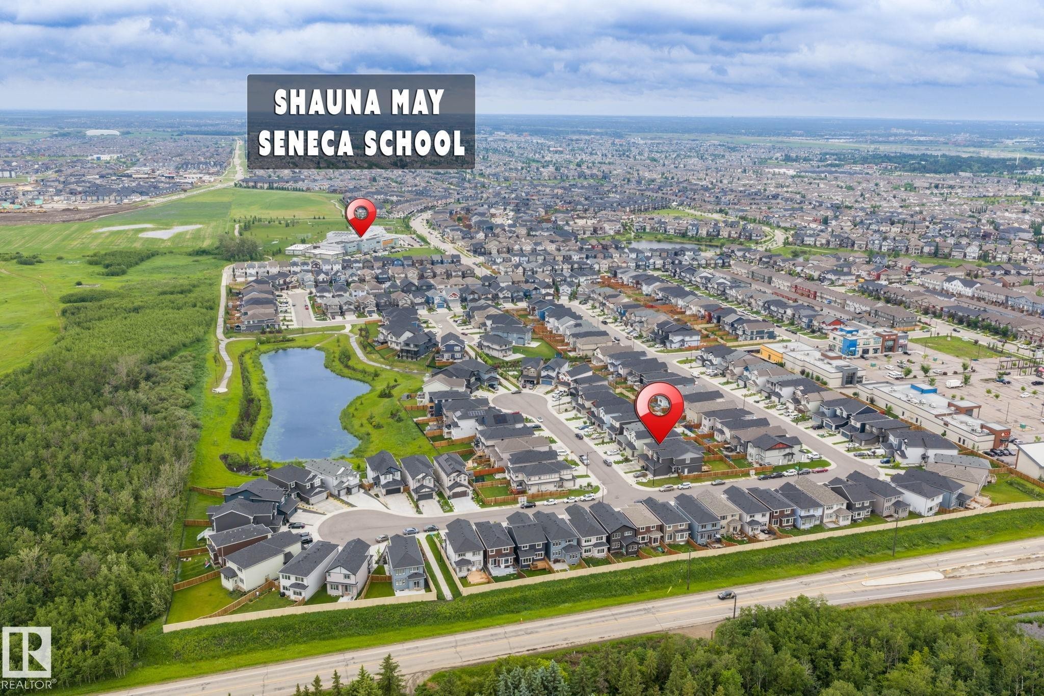 Aerial view showcasing a residential development with varied housing styles - 5110 23A Ave Sw, Edmonton, AB