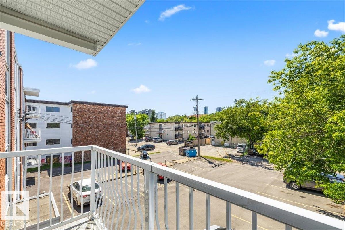 Private balcony with white metal railing - #306 10330 113 St Nw, Edmonton, AB