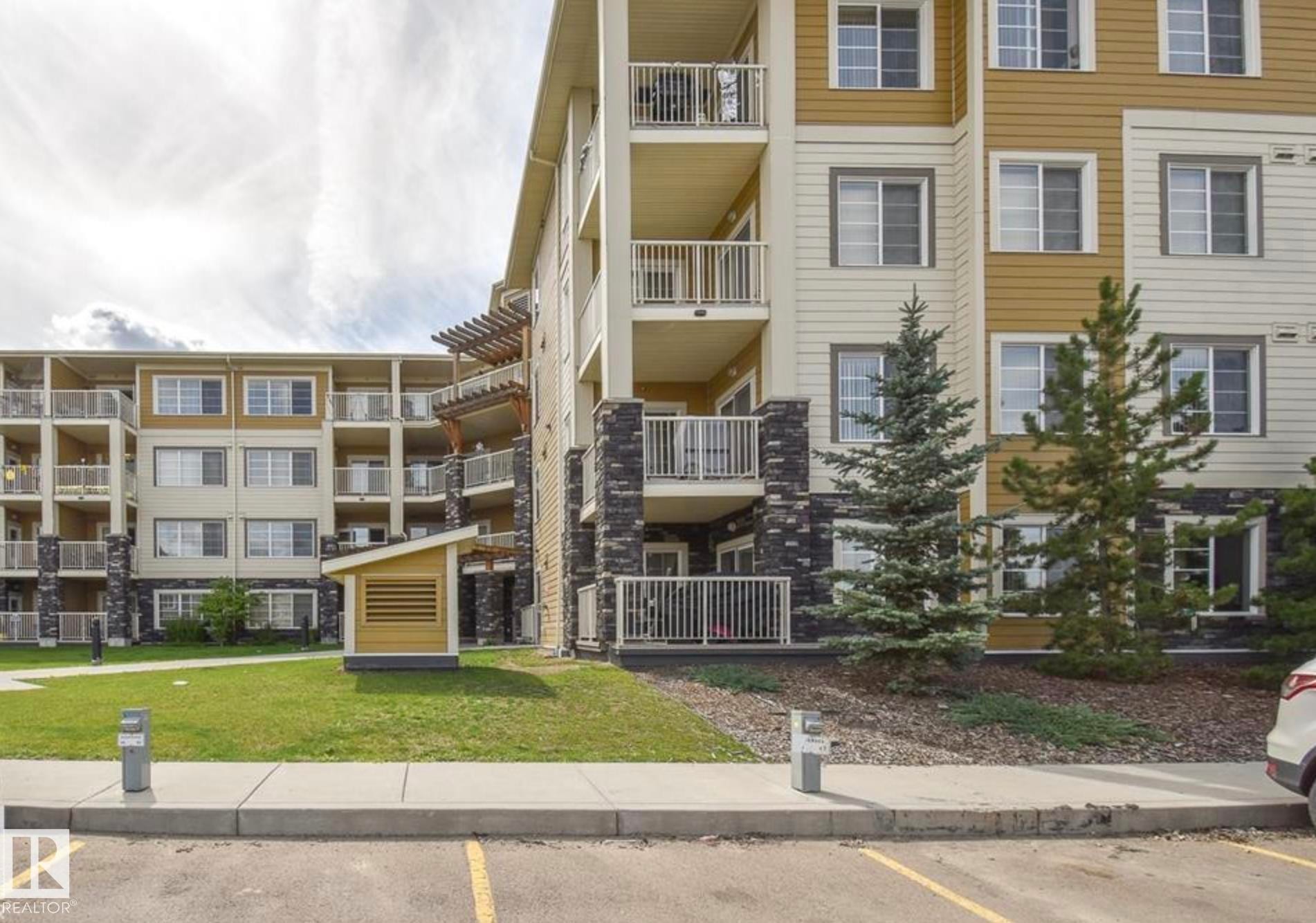 #210 3670 139 Av Nw, Edmonton, AB - Outdoor With Balcony With Facade