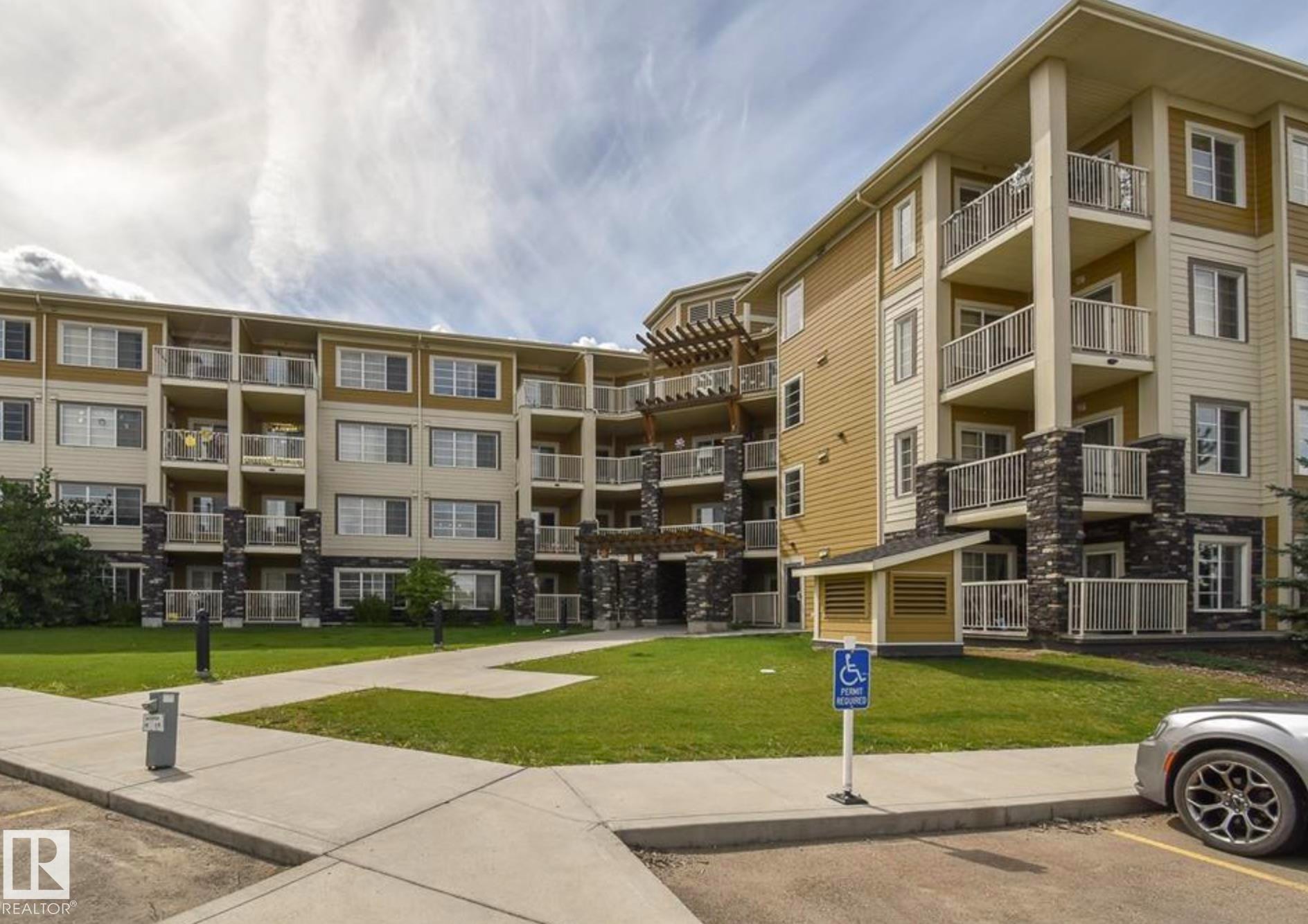 #210 3670 139 Av Nw, Edmonton, AB - Outdoor With Balcony With Facade