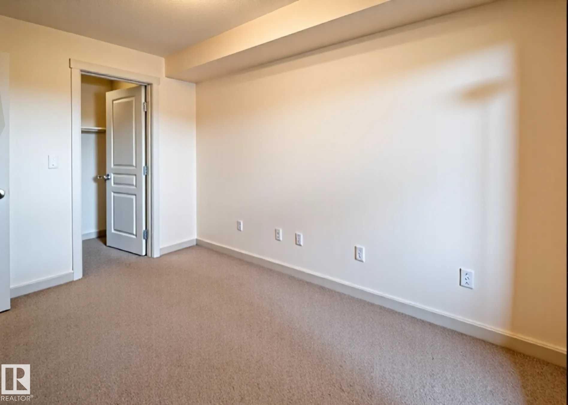 #210 3670 139 Av Nw, Edmonton, AB - Indoor Photo Showing Other Room