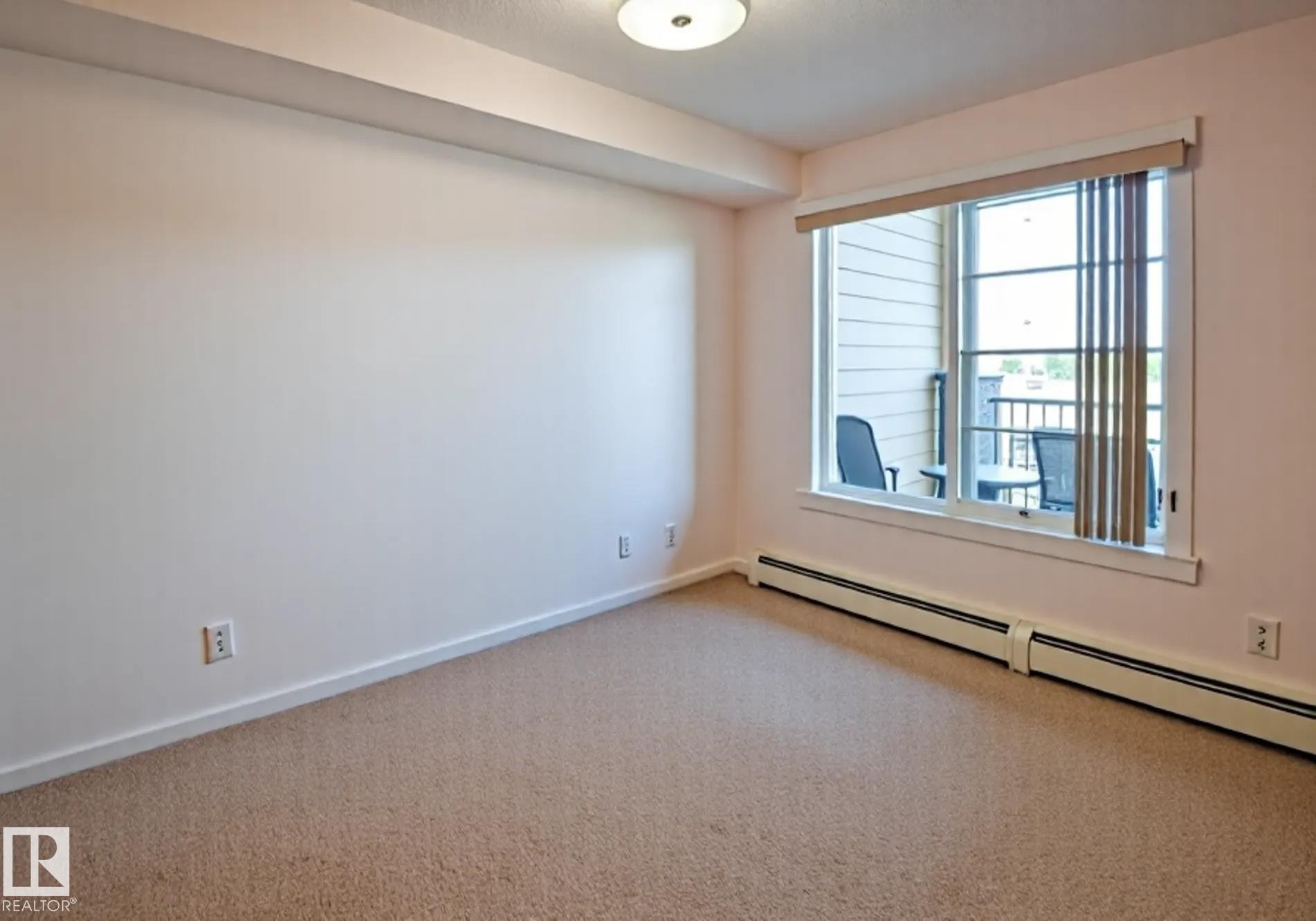 #210 3670 139 Av Nw, Edmonton, AB - Indoor Photo Showing Other Room