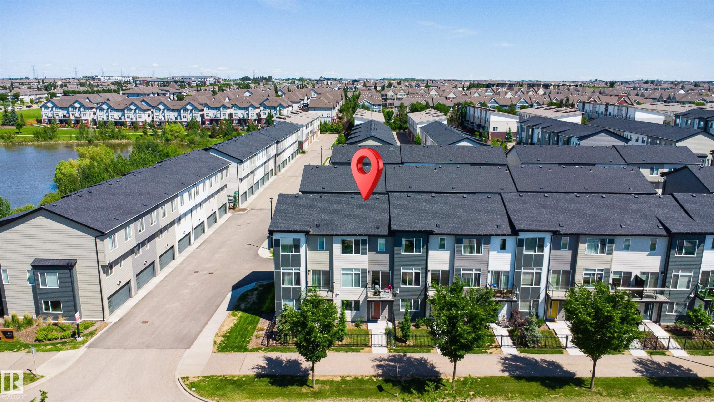 Modern townhome with a multi-level facade, private balcony, and individual entry - 170 804 Welsh Drive, Edmonton, AB