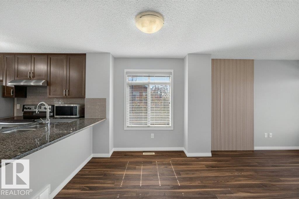 #39 7503 Getty Ga Nw, Edmonton, AB - Indoor Photo Showing Kitchen With Double Sink