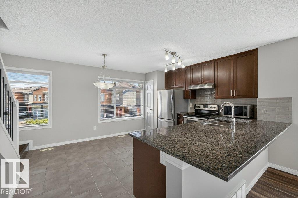 #39 7503 Getty Ga Nw, Edmonton, AB - Indoor Photo Showing Kitchen With Double Sink With Upgraded Kitchen