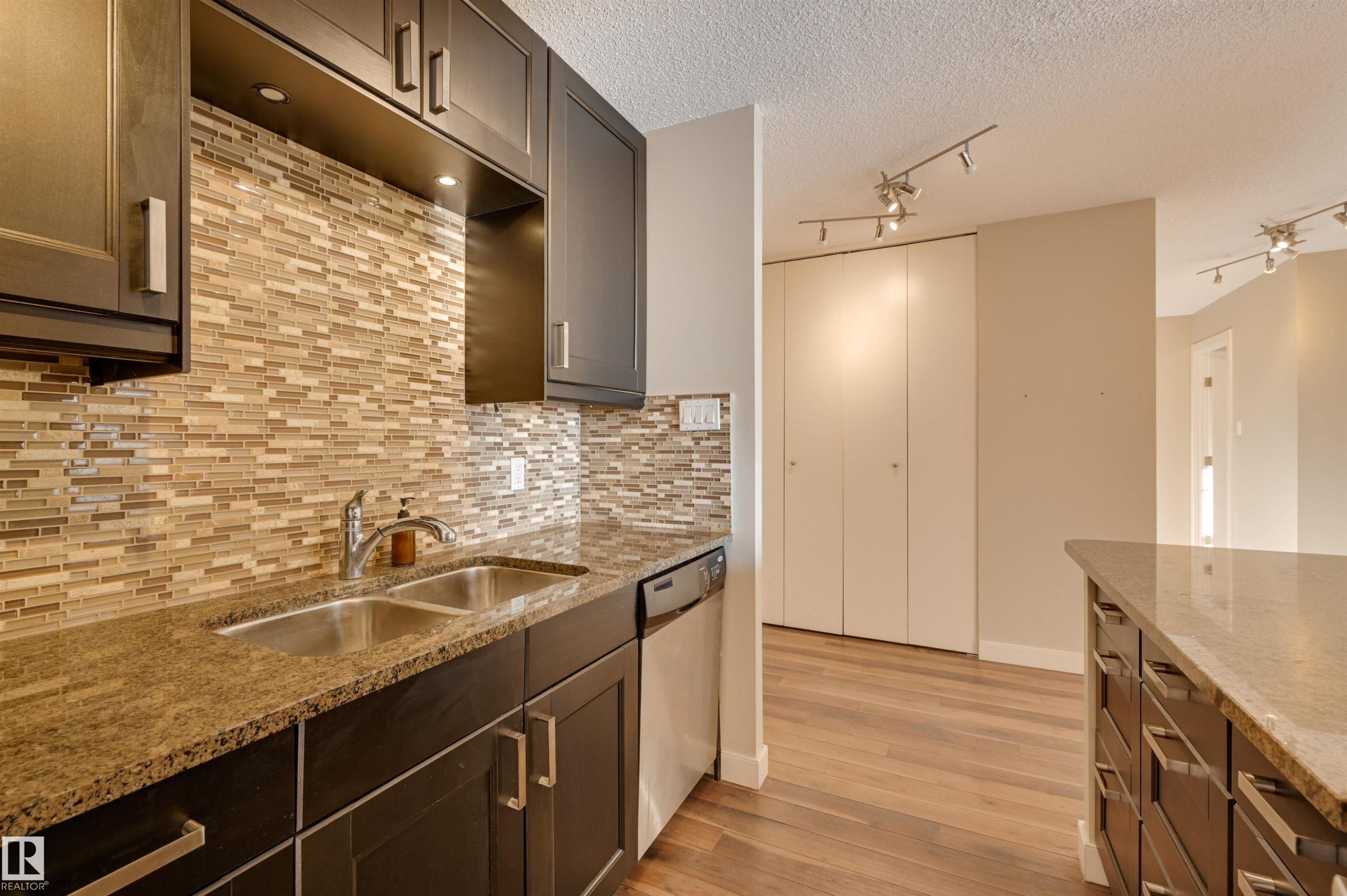 #406 12141 Jasper Av Nw, Edmonton, AB - Indoor Photo Showing Kitchen With Double Sink With Upgraded Kitchen