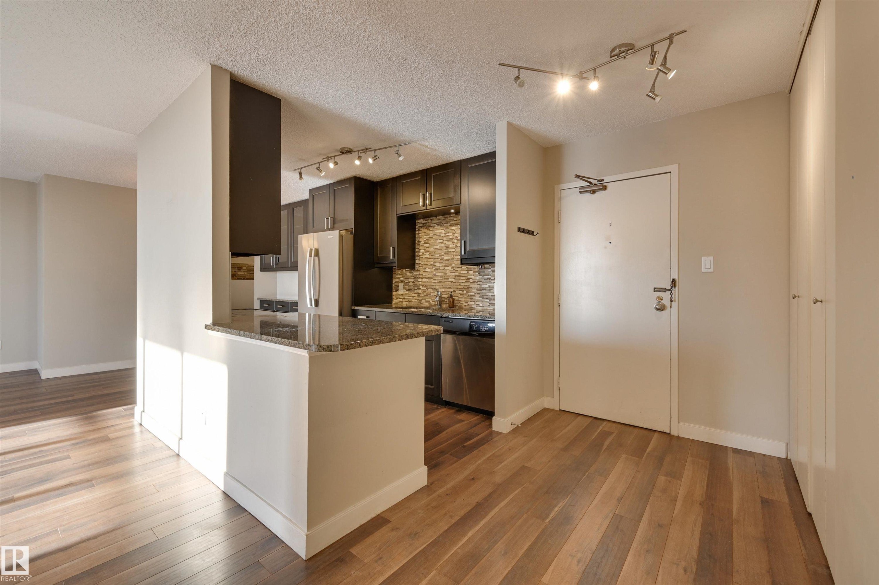 #406 12141 Jasper Av Nw, Edmonton, AB - Indoor Photo Showing Kitchen With Upgraded Kitchen