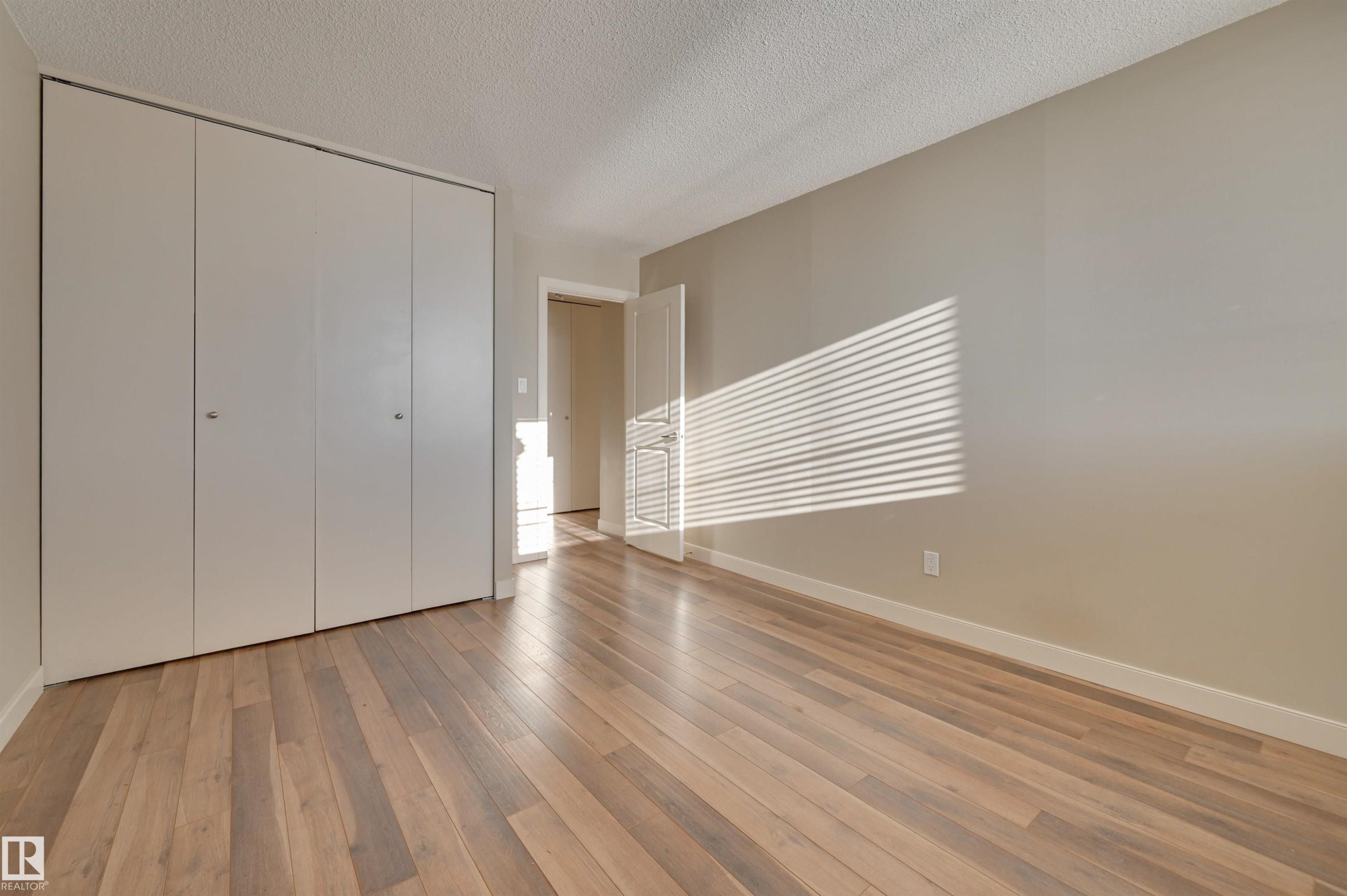 #406 12141 Jasper Av Nw, Edmonton, AB - Indoor Photo Showing Other Room
