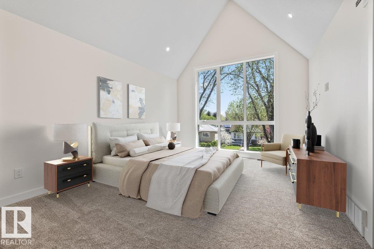 Soaring vaulted ceiling in a bedroom featuring a large picture window, recessed lighting, neutral carpeting, and white walls - 10932 132 Street, Edmonton, AB - Indoor Photo Showing Bedroom