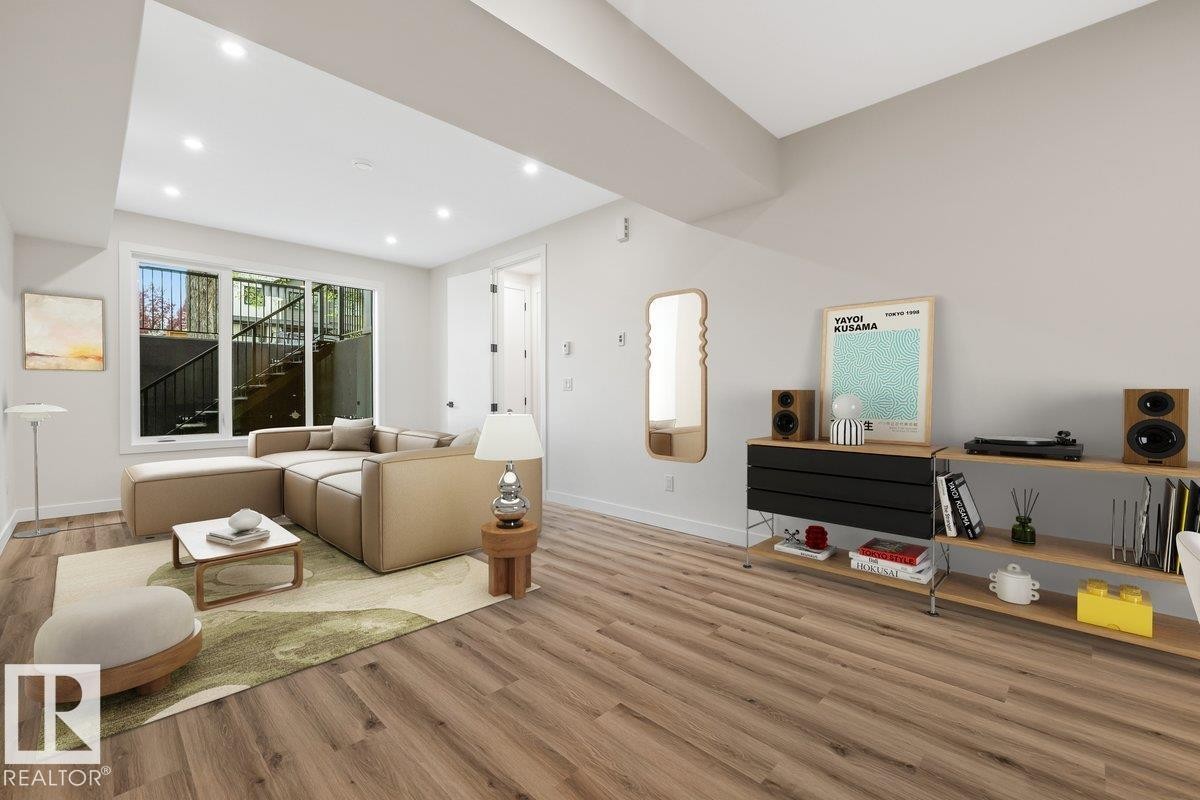 Open-concept living space with wood-finish flooring - 10932 132 Street, Edmonton, AB - Indoor