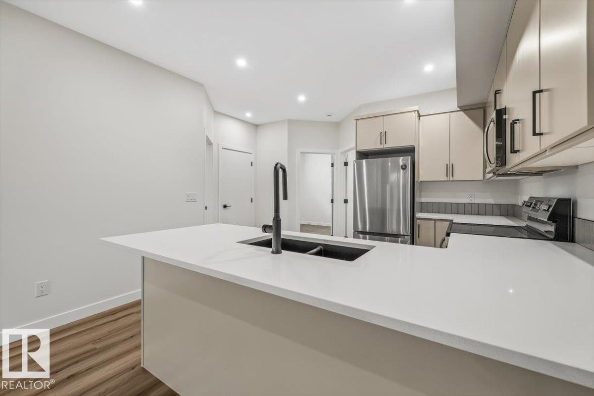 10932 132 Street, Edmonton, AB - Indoor Photo Showing Kitchen With Double Sink With Upgraded Kitchen
