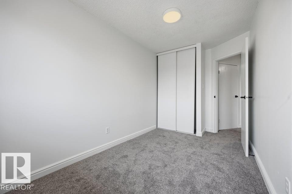 #105 14530 52 St Nw, Edmonton, AB - Indoor Photo Showing Other Room