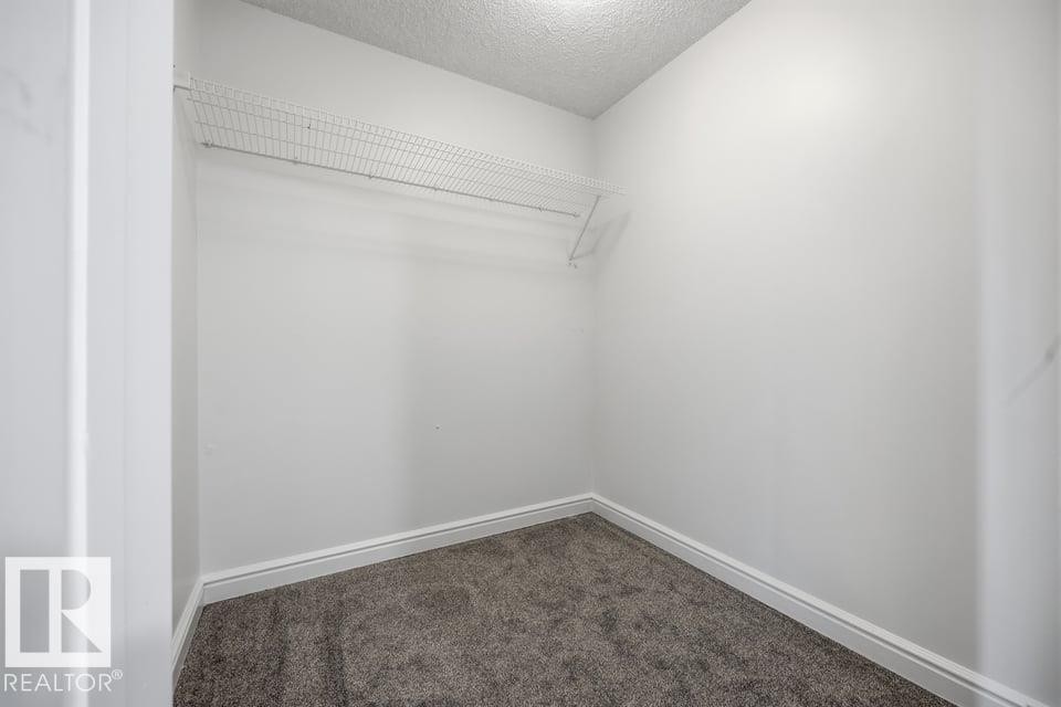 #105 14530 52 St Nw, Edmonton, AB - Indoor Photo Showing Other Room