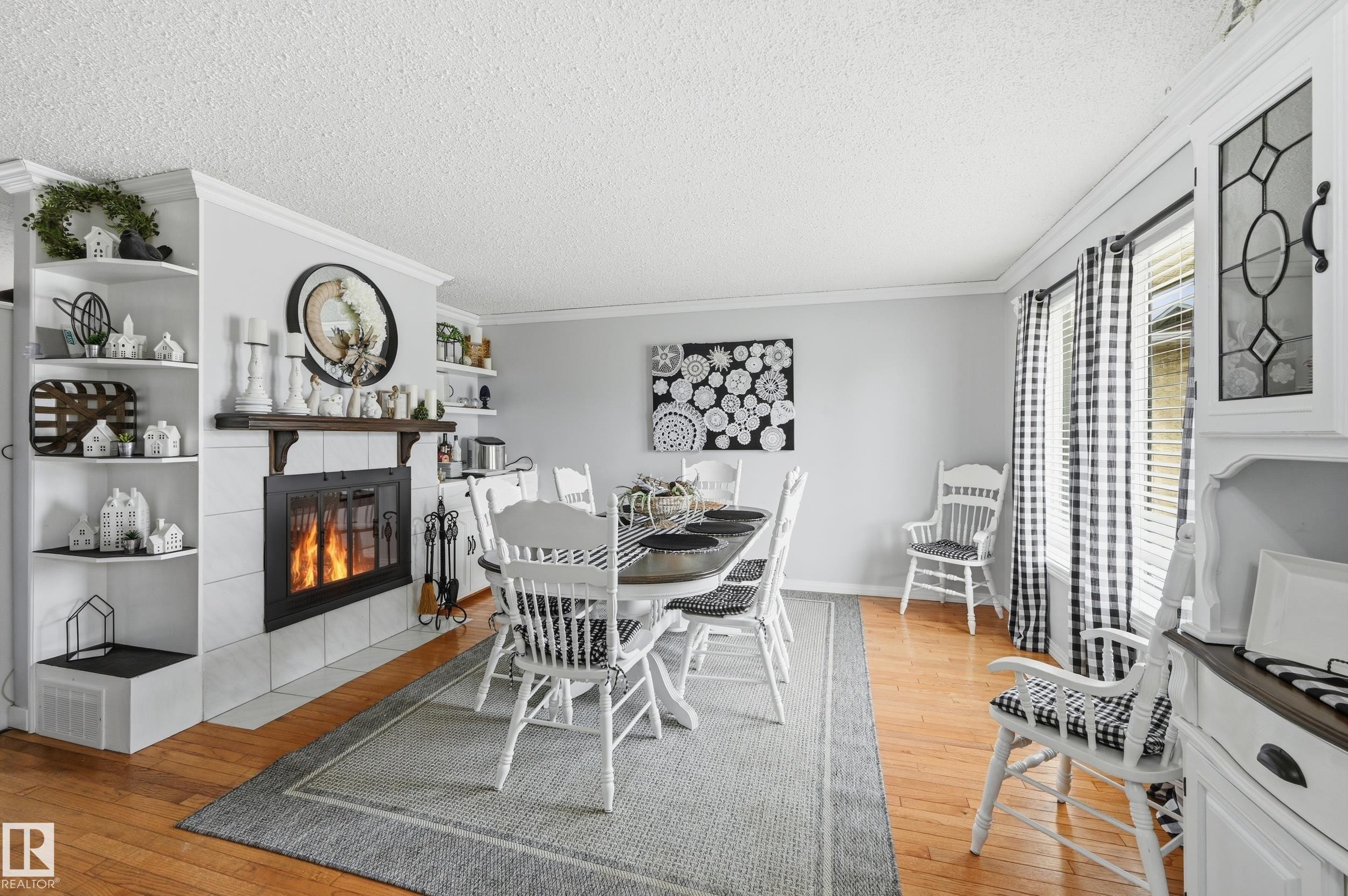 3332 138 Avenue Nw, Edmonton, AB - Indoor Photo Showing Dining Room With Fireplace
