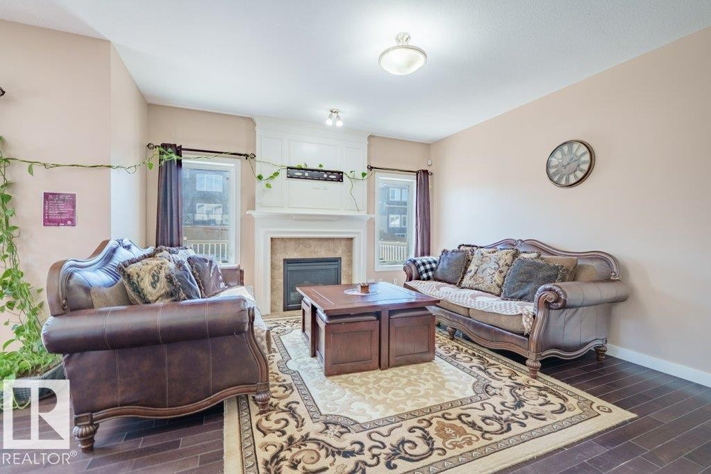 6103 18 Avenue Sw, Edmonton, AB - Indoor Photo Showing Living Room With Fireplace