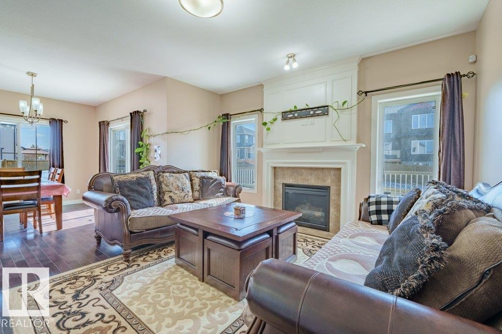 6103 18 Avenue Sw, Edmonton, AB - Indoor Photo Showing Living Room With Fireplace