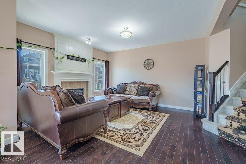 6103 18 Avenue Sw, Edmonton, AB - Indoor Photo Showing Living Room With Fireplace
