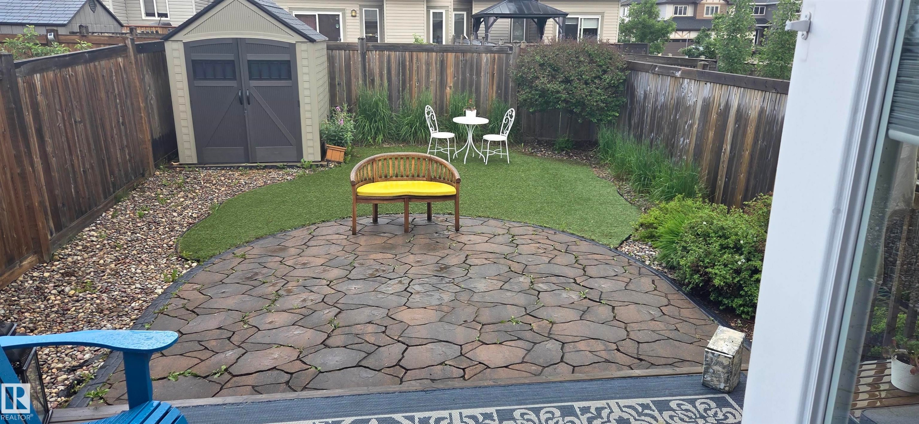 Paved patio area featuring irregular-shaped stone pavers - 16505 133 Street, Edmonton, AB