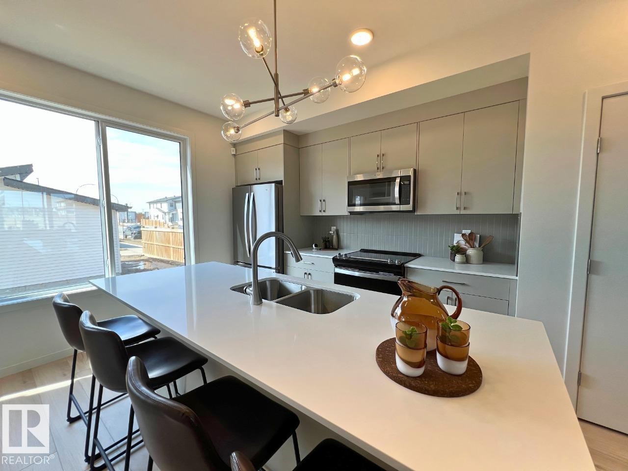 8164 228 Street Nw, Edmonton, AB - Indoor Photo Showing Kitchen With Stainless Steel Kitchen With Double Sink With Upgraded Kitchen