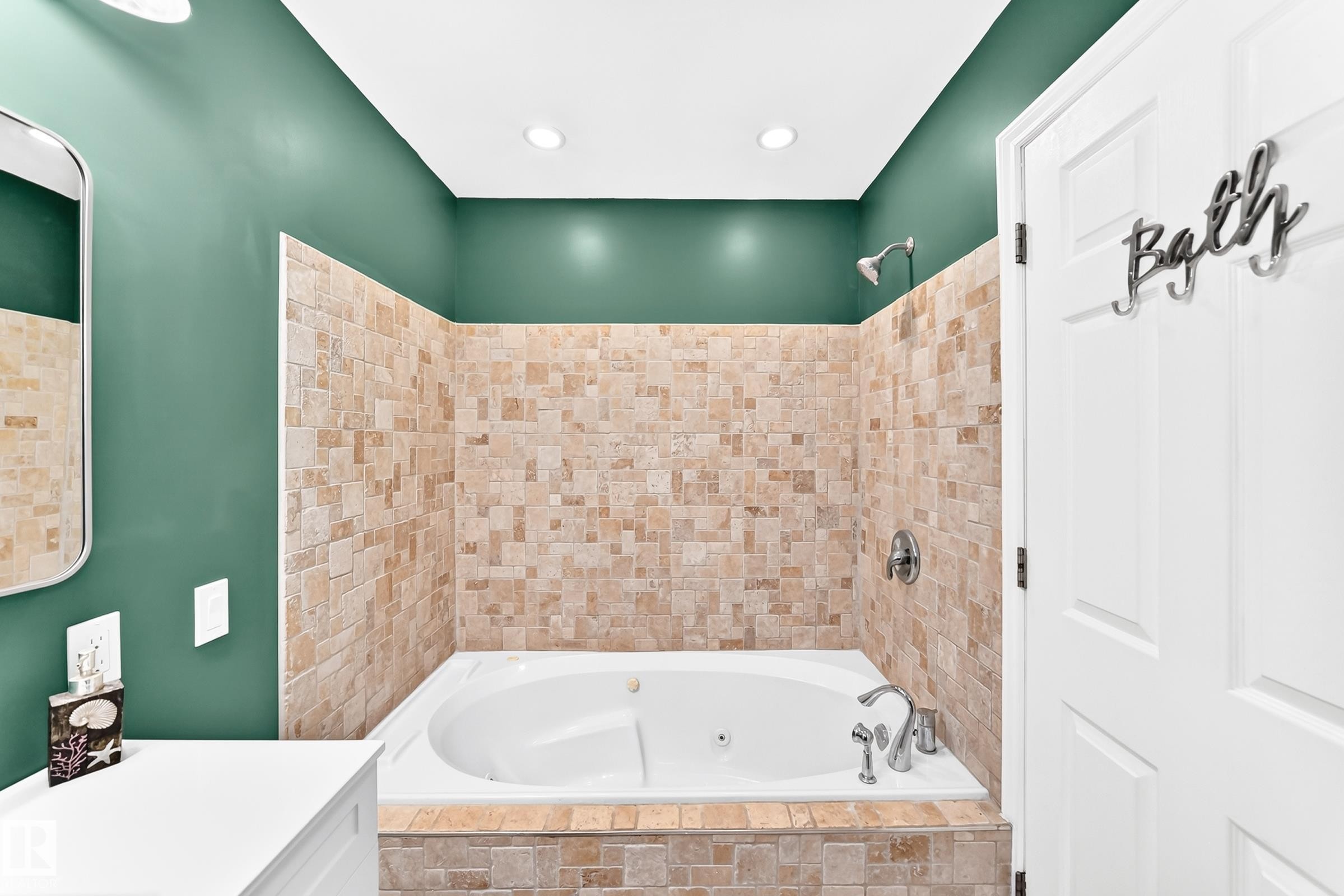 Soaking tub with integrated jets and chrome fixtures - 1763 48A Street, Edmonton, AB