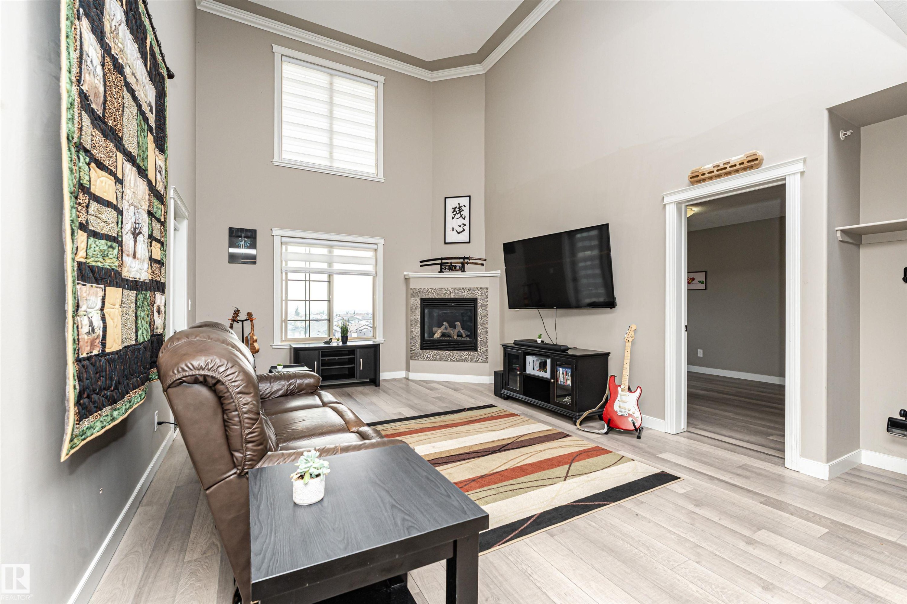 #406 16235 51 St Nw, Edmonton, AB - Indoor Photo Showing Living Room With Fireplace