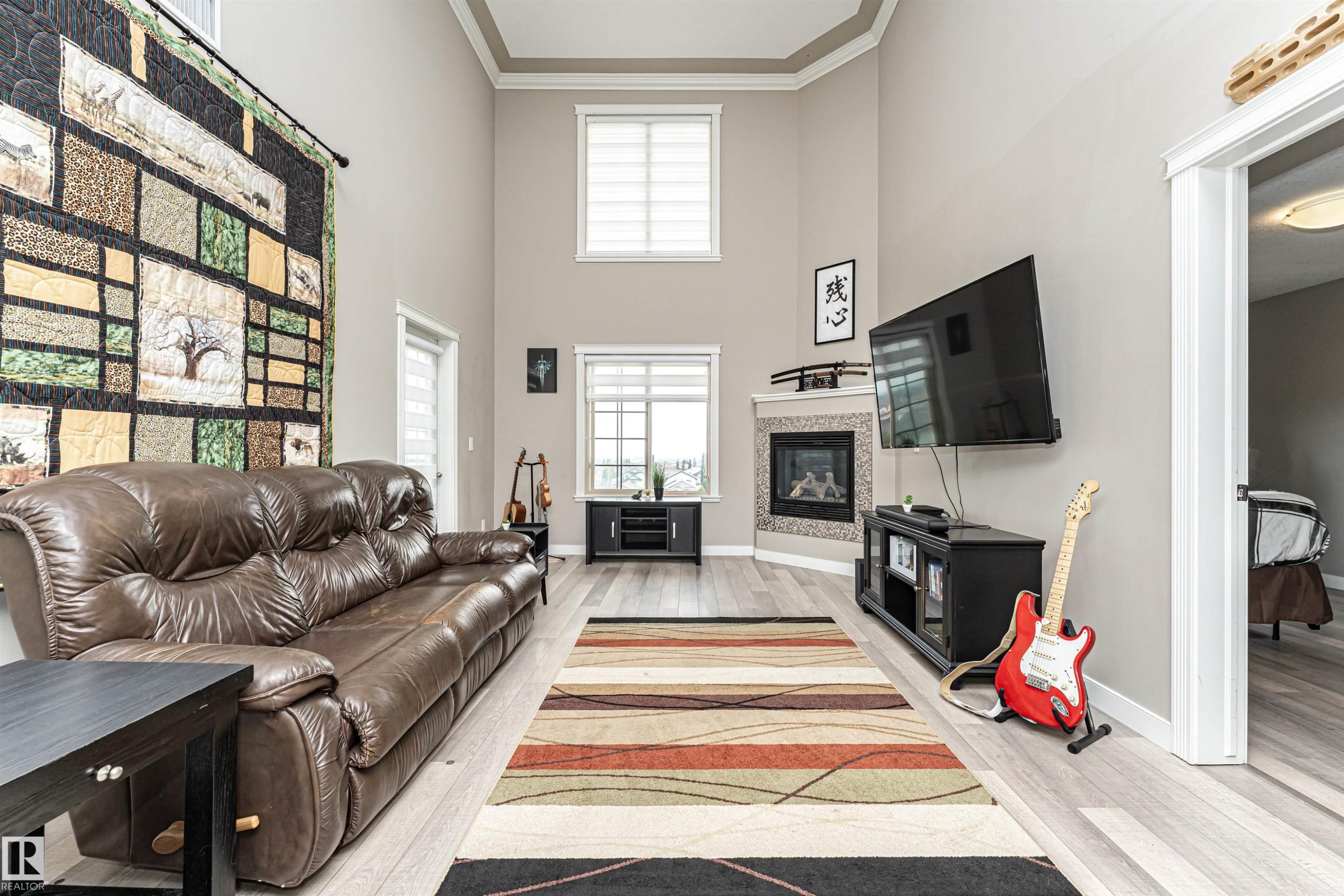 #406 16235 51 St Nw, Edmonton, AB - Indoor Photo Showing Living Room With Fireplace