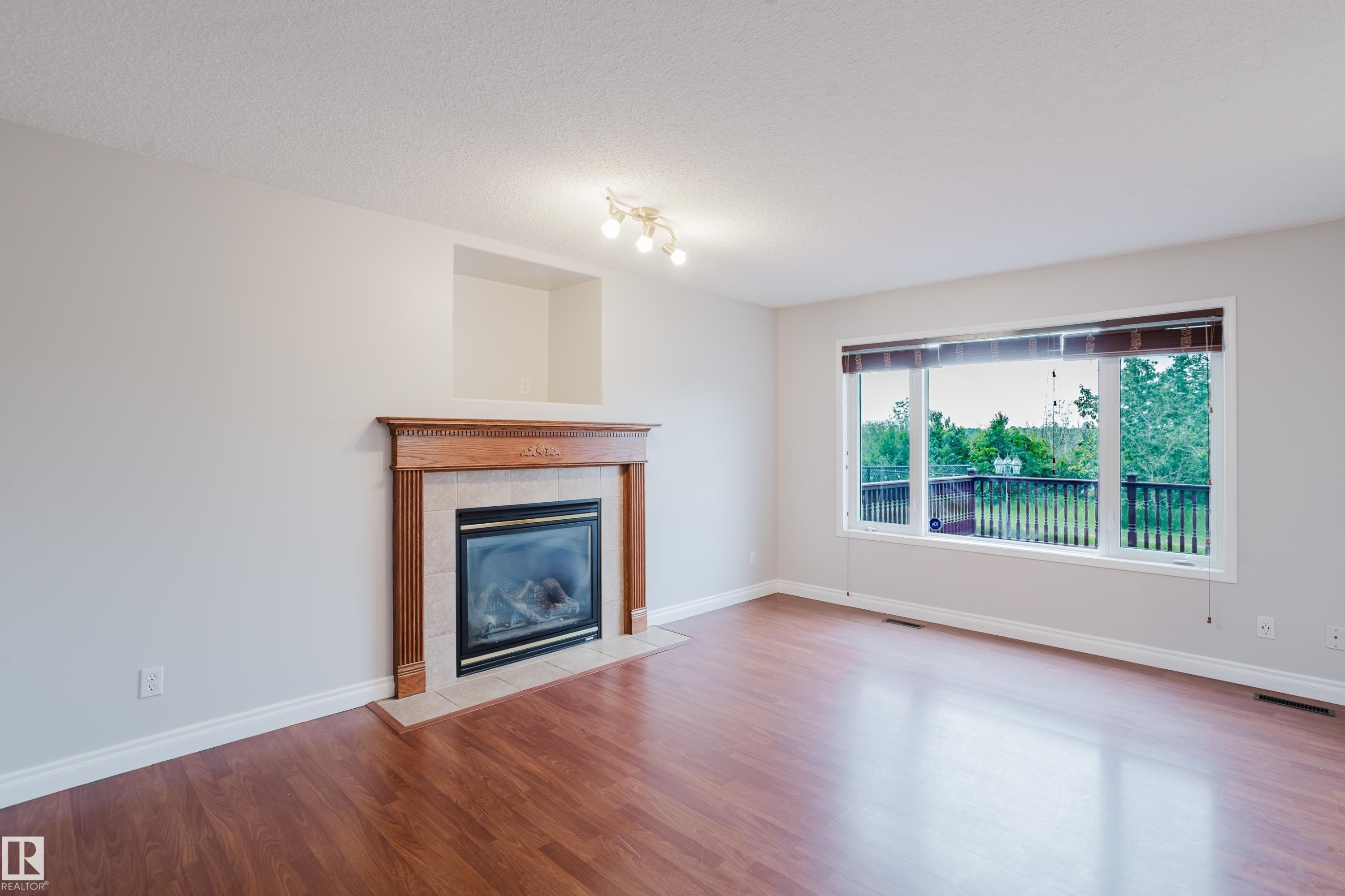 611 Hooke Court Nw, Edmonton, AB - Indoor Photo Showing Living Room With Fireplace