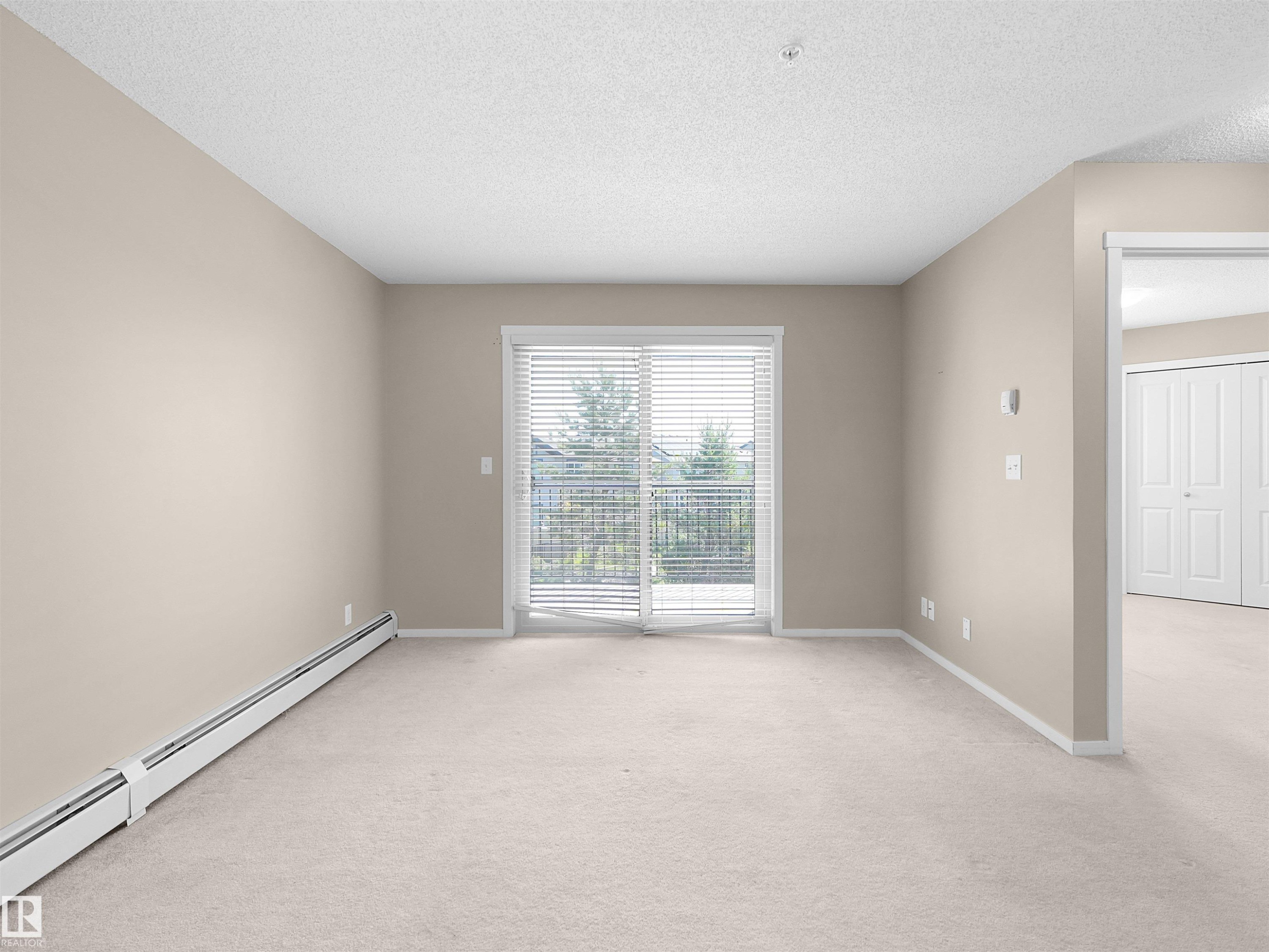 #211 3207 James Mowatt Trail Sw, Edmonton, AB - Indoor Photo Showing Other Room