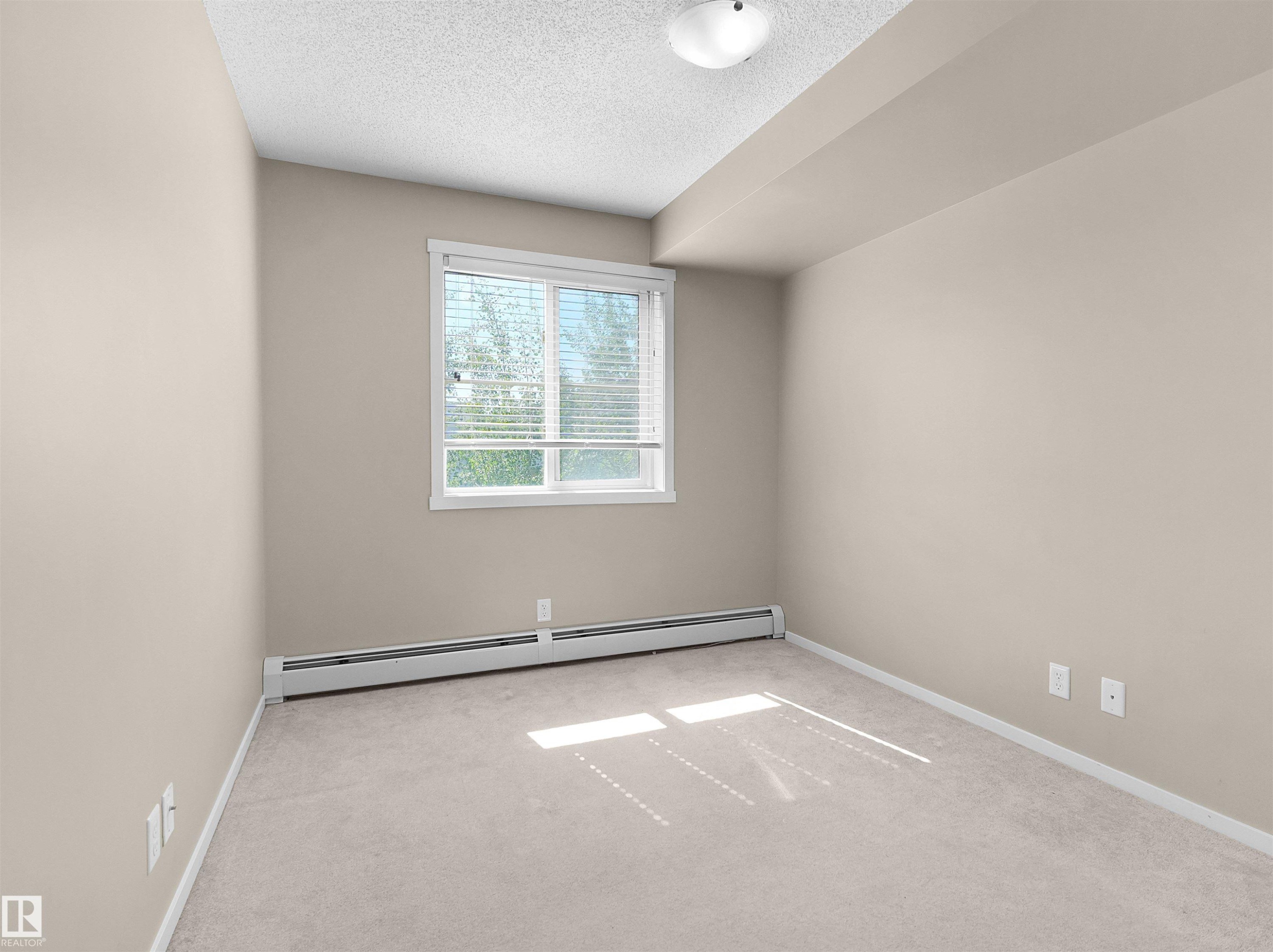 #211 3207 James Mowatt Trail Sw, Edmonton, AB - Indoor Photo Showing Other Room