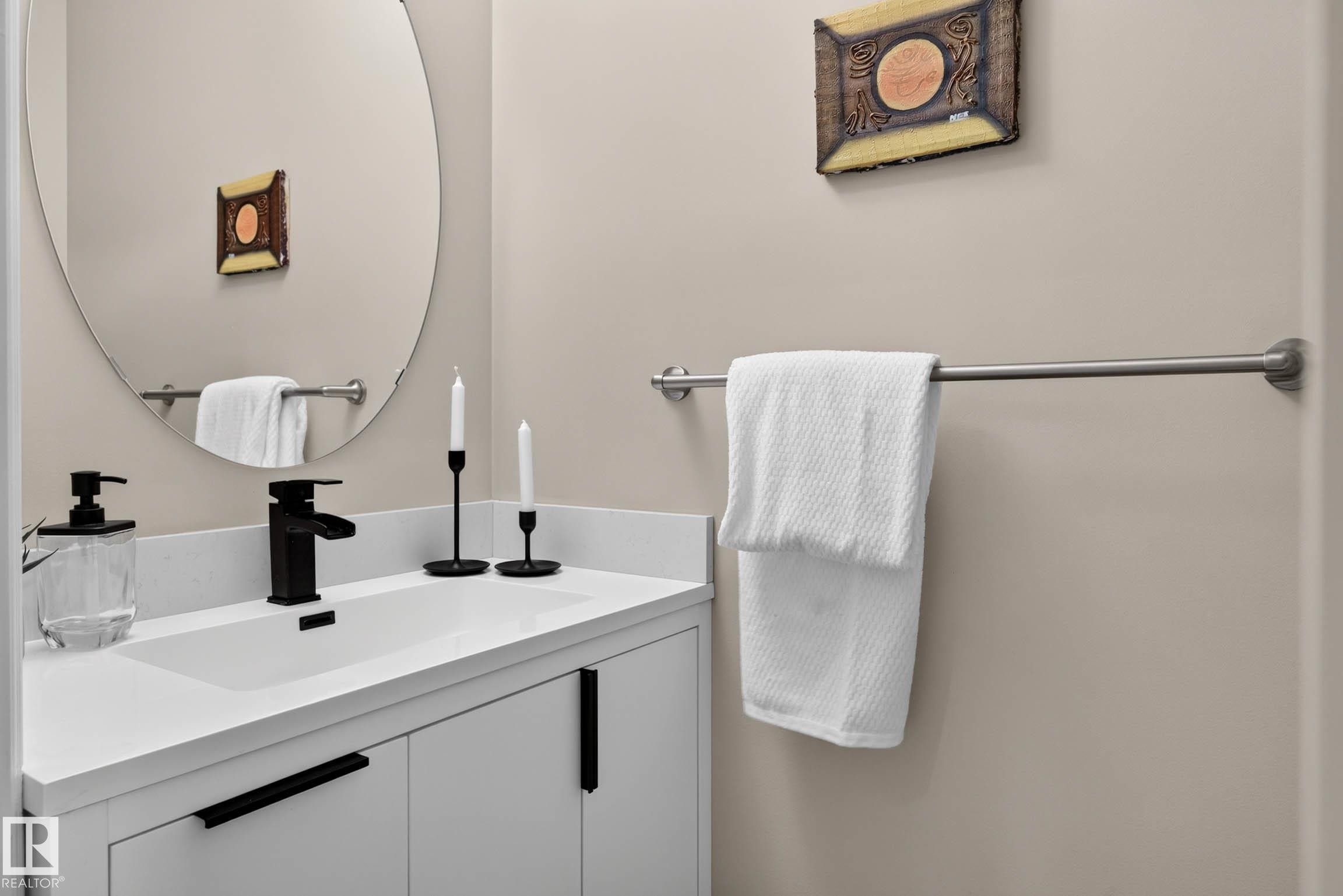 Vanity with integrated sink and matte black faucet - 12119 167A Avenue, Edmonton, AB