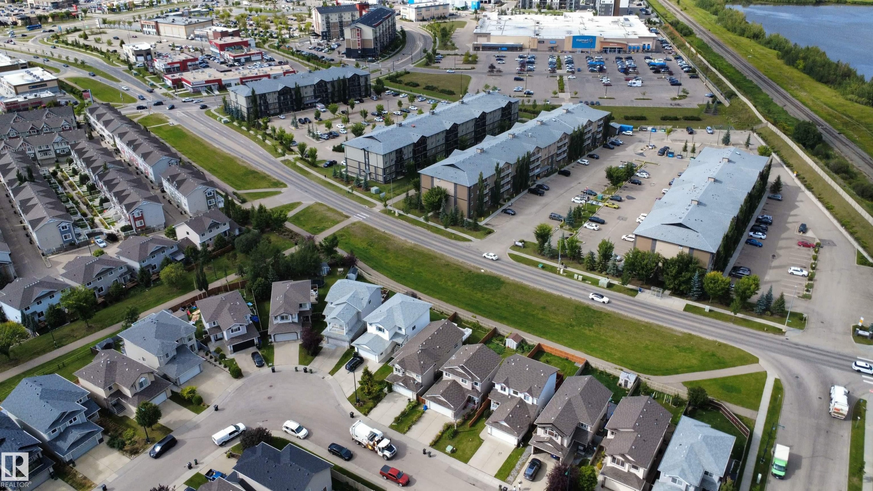 Aerial perspective showcasing a residential community with varied architectural styles - 1216 37C Avenue Nw, Edmonton, AB - Outdoor With View