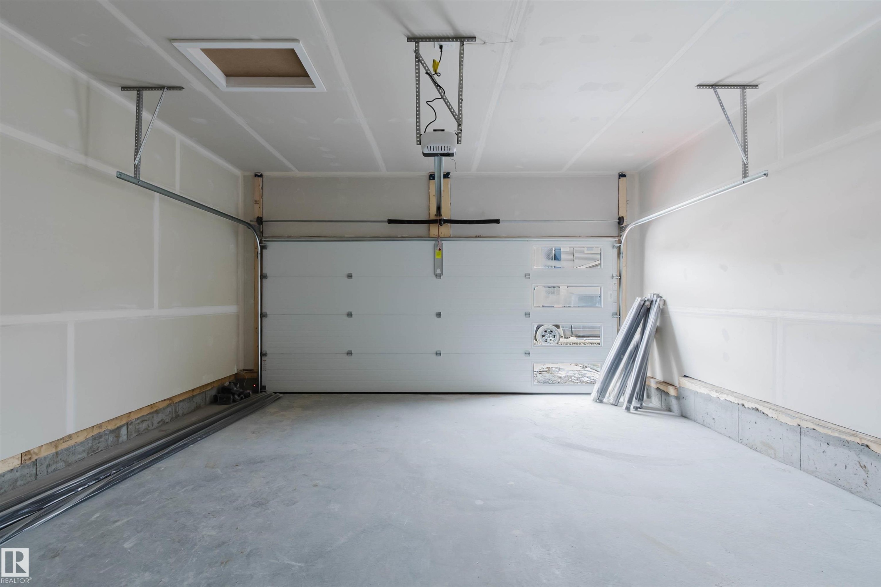 8300 Kiriak Loop Sw, Edmonton, AB - Indoor Photo Showing Garage
