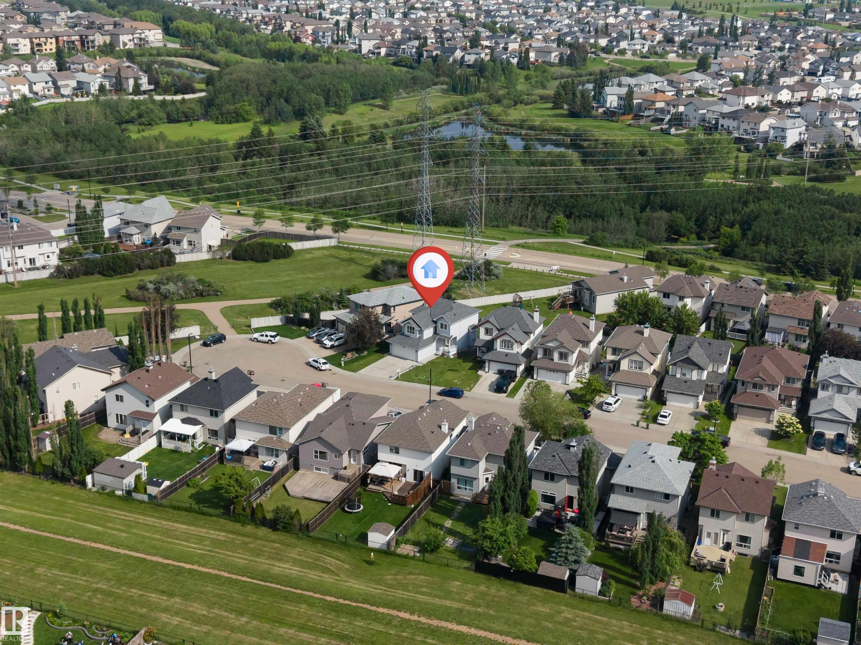 Aerial perspective showcasing a residential neighborhood with varied architectural styles - 3449 28 Street, Edmonton, AB