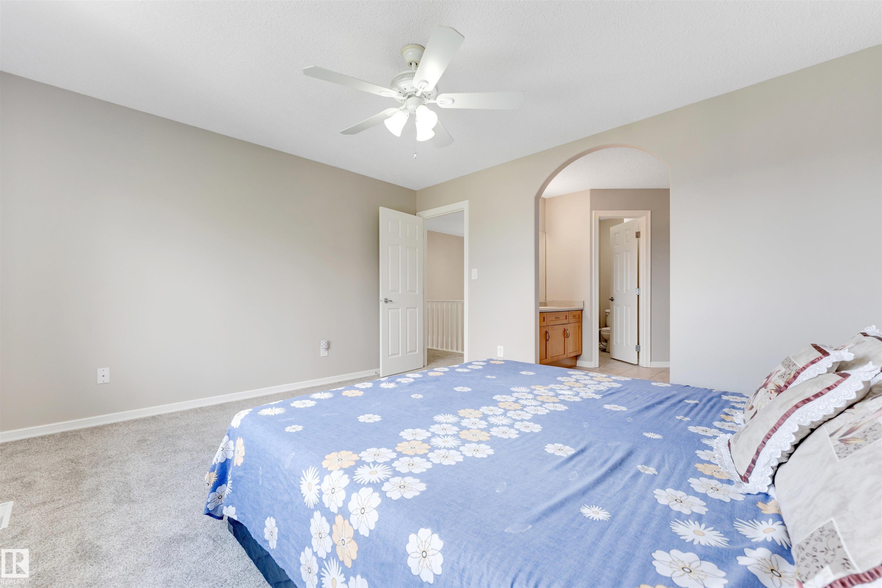 Carpeted room with a ceiling fan - 3449 28 Street, Edmonton, AB