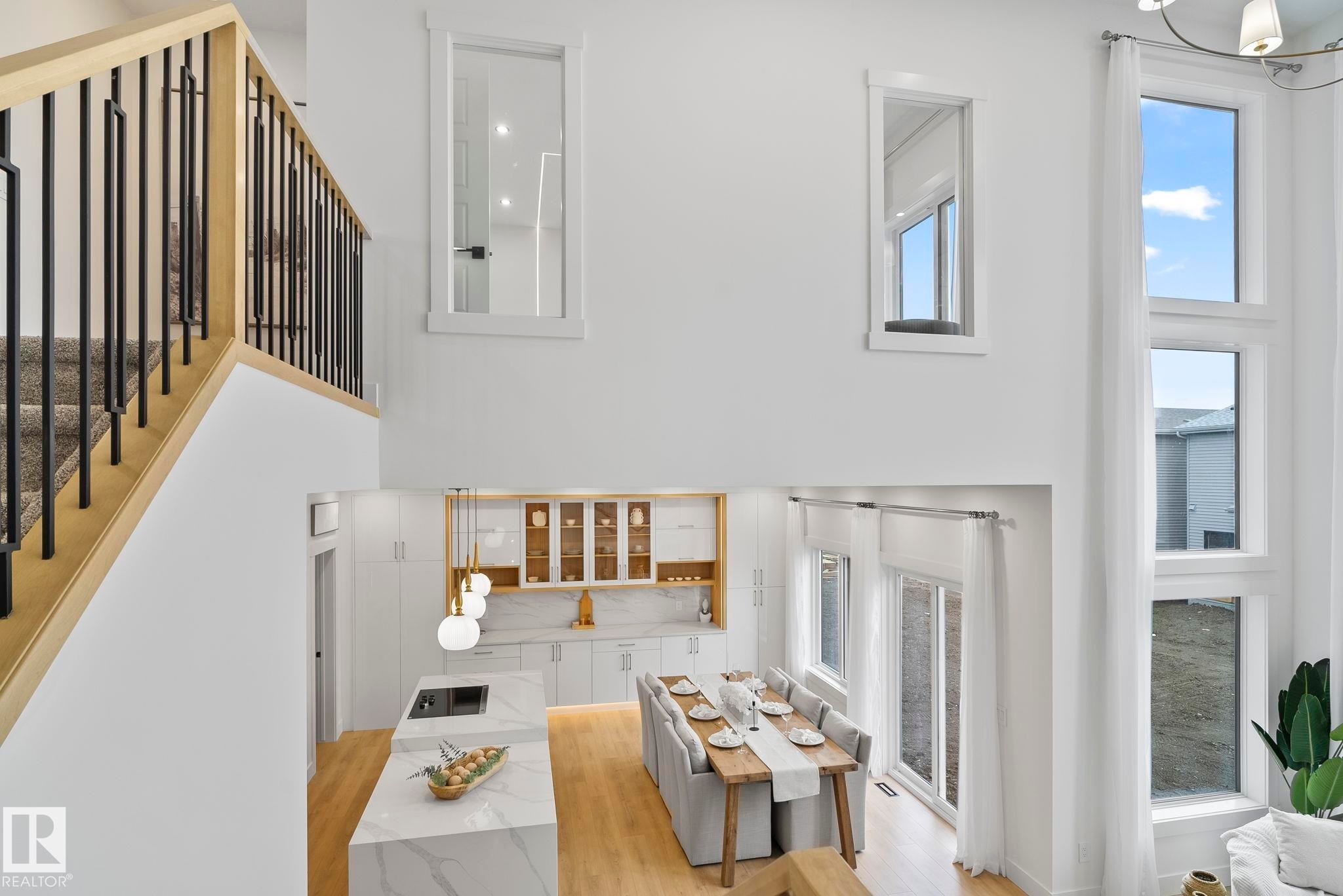 Two-story living area with high ceilings and expansive windows - 13152 187 Avenue, Edmonton, AB