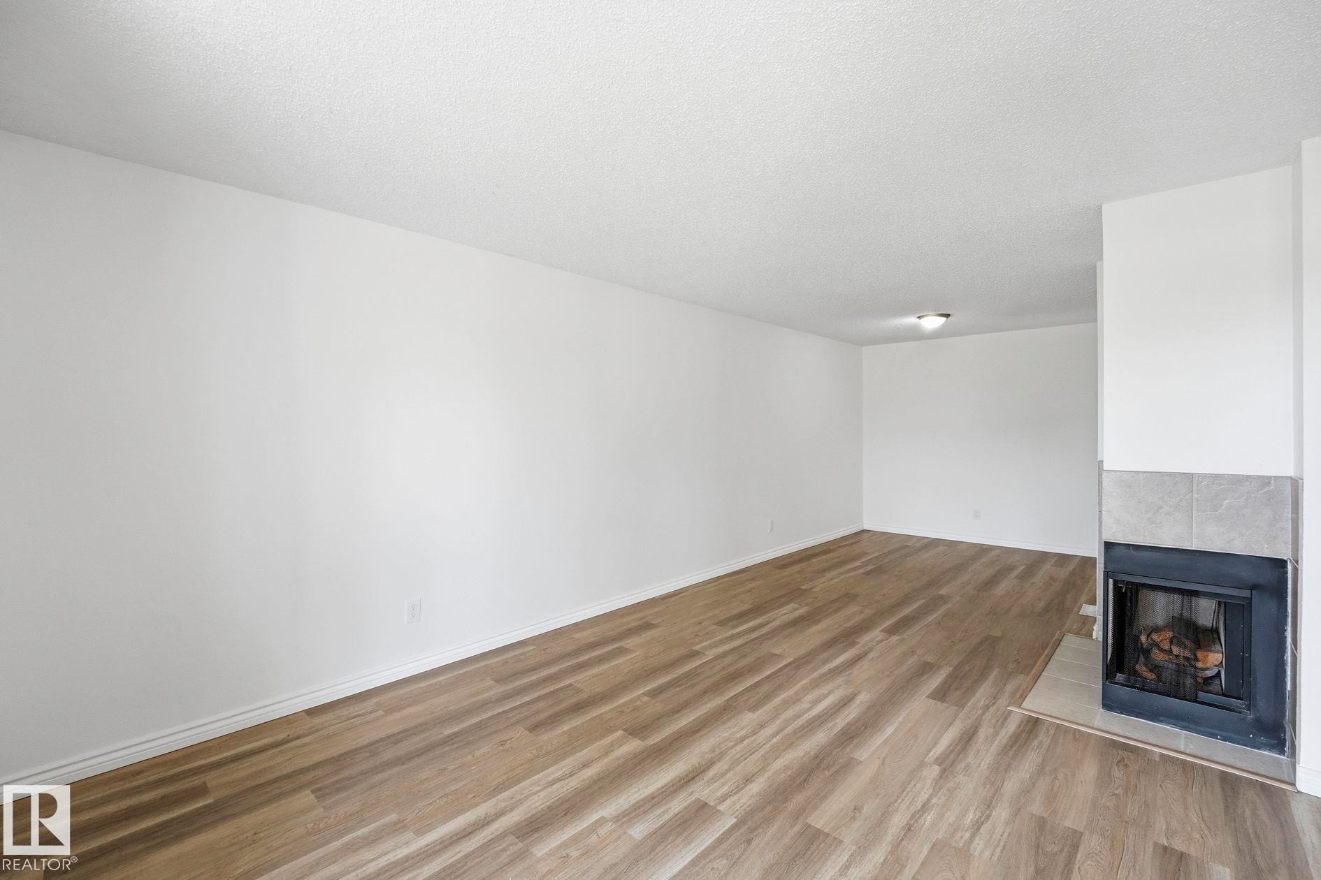 #123 2703 79 St Nw, Edmonton, AB - Indoor With Fireplace