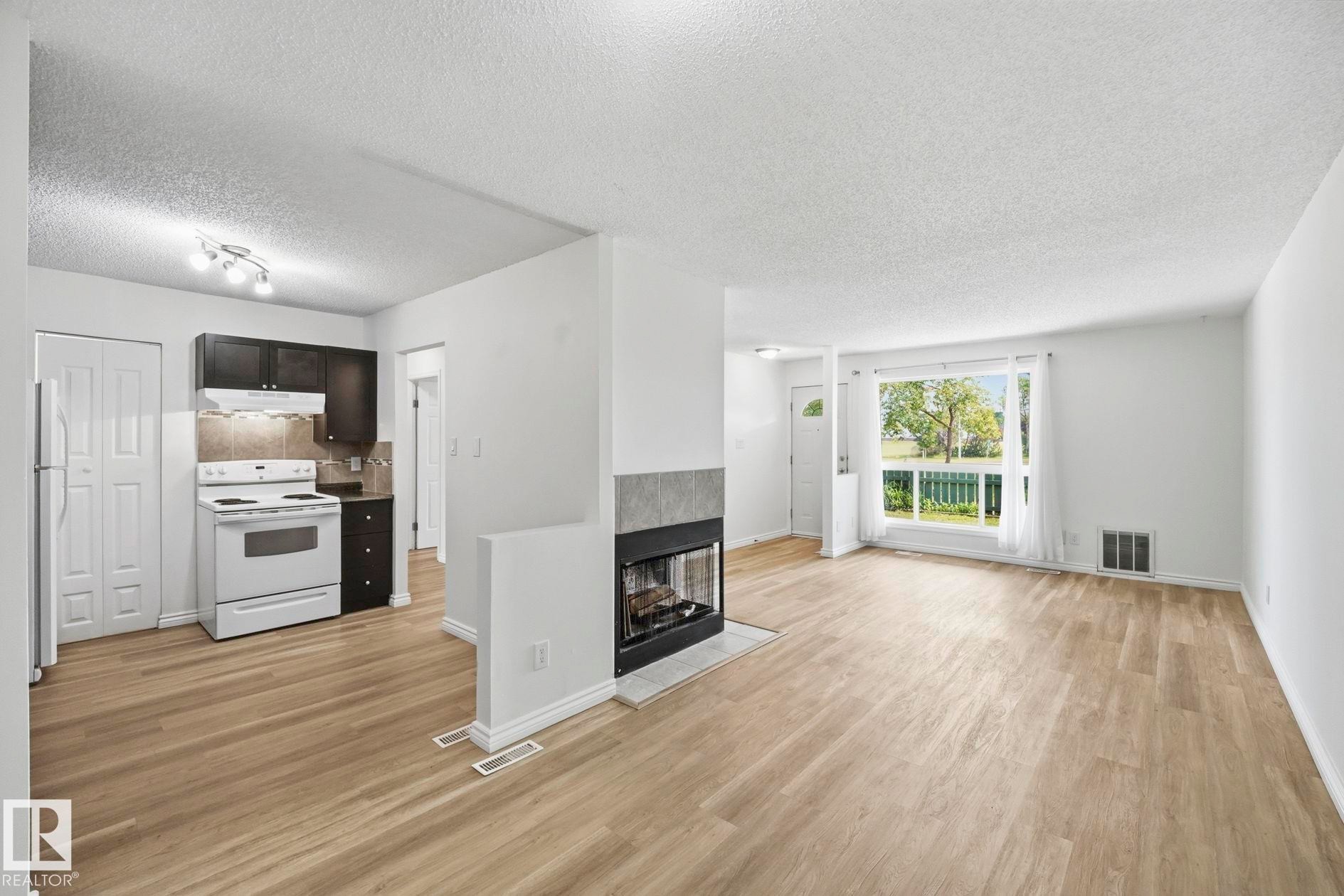 #123 2703 79 St Nw, Edmonton, AB - Indoor With Fireplace