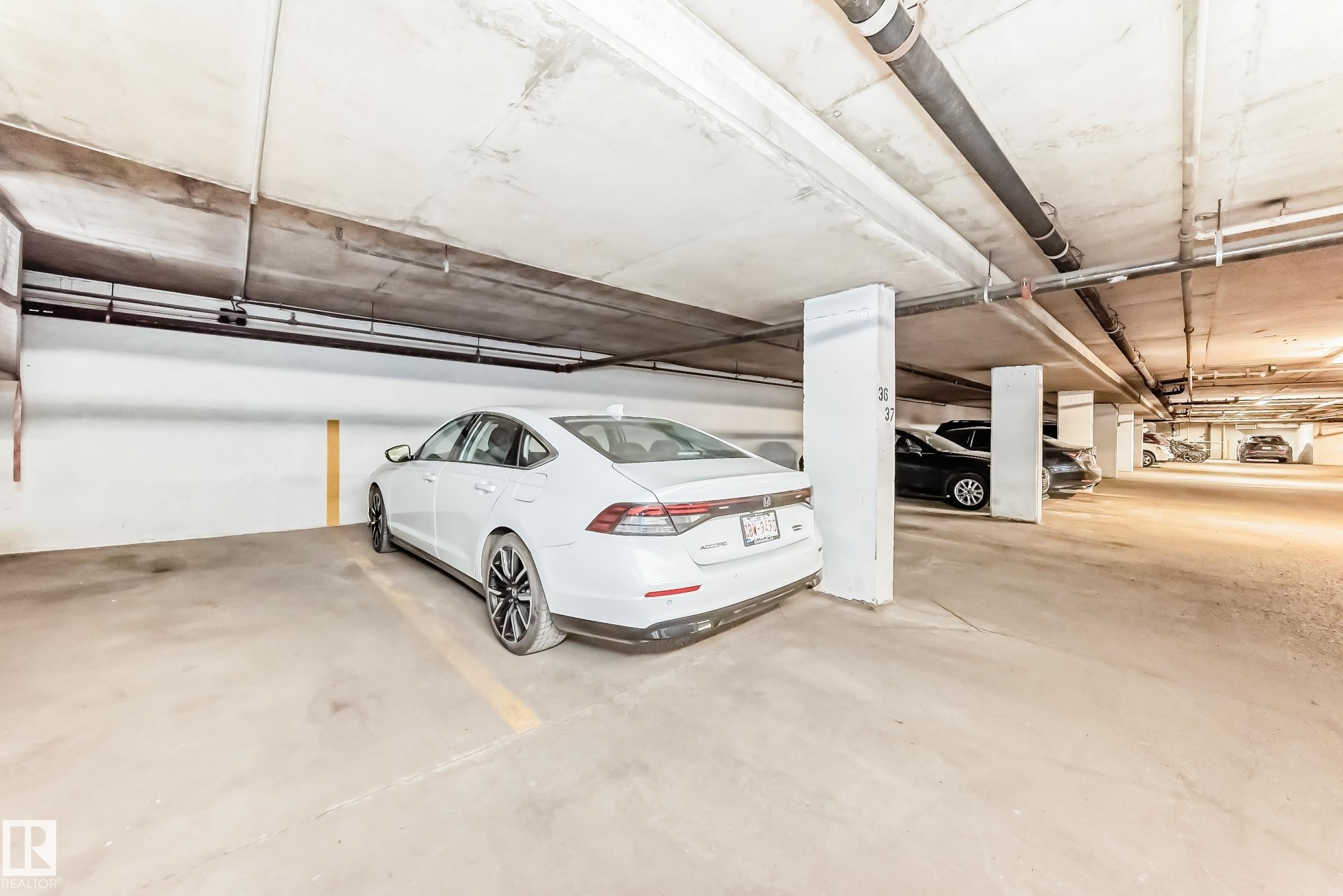 #36 SINGLE TITLED STALL INCLUDED. Three total spaces titled. - 7930 111 Street, Edmonton, AB - Indoor Photo Showing Garage