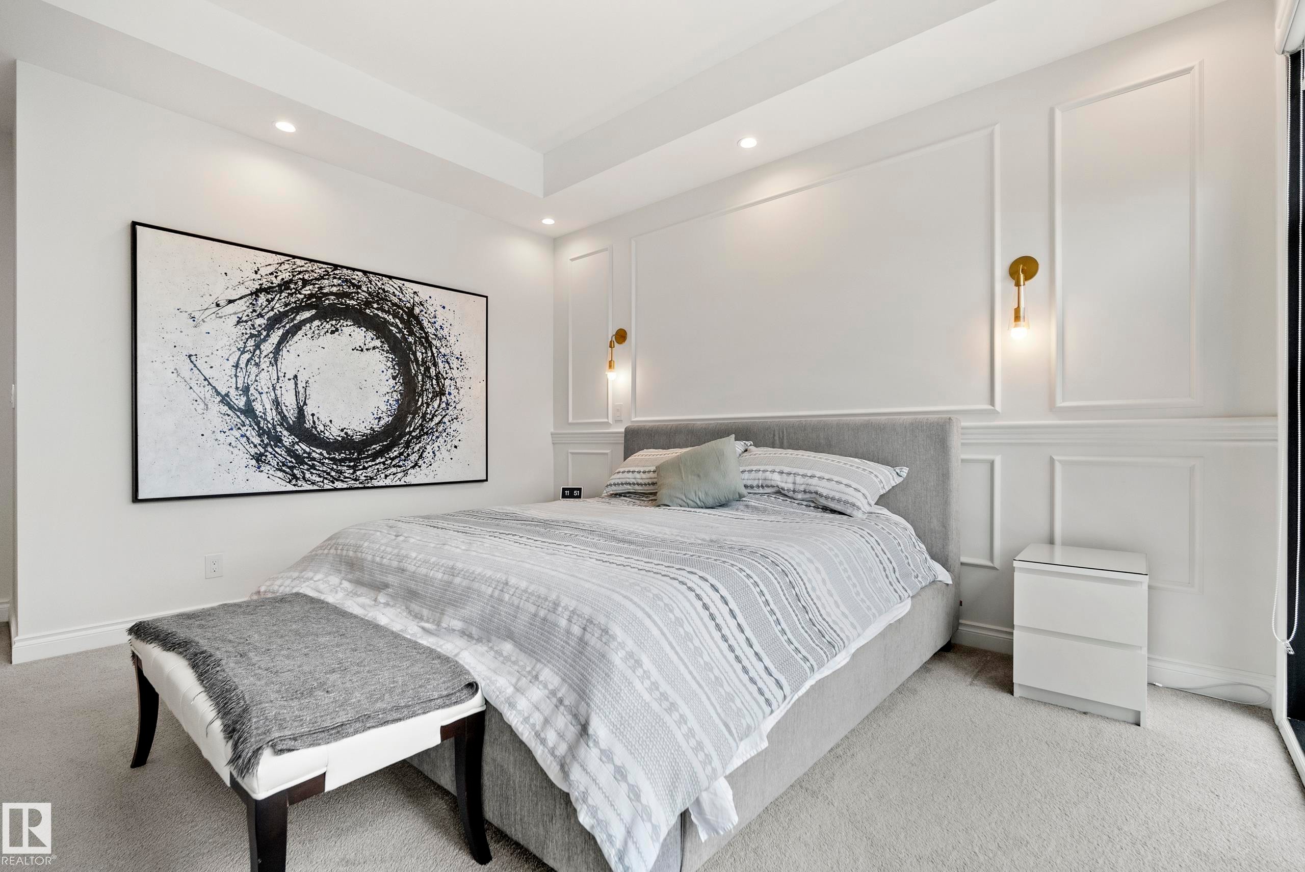 Recessed lighting illuminates a space featuring wainscoting and wall molding - 6115 111 Avenue, Edmonton, AB - Indoor Photo Showing Bedroom