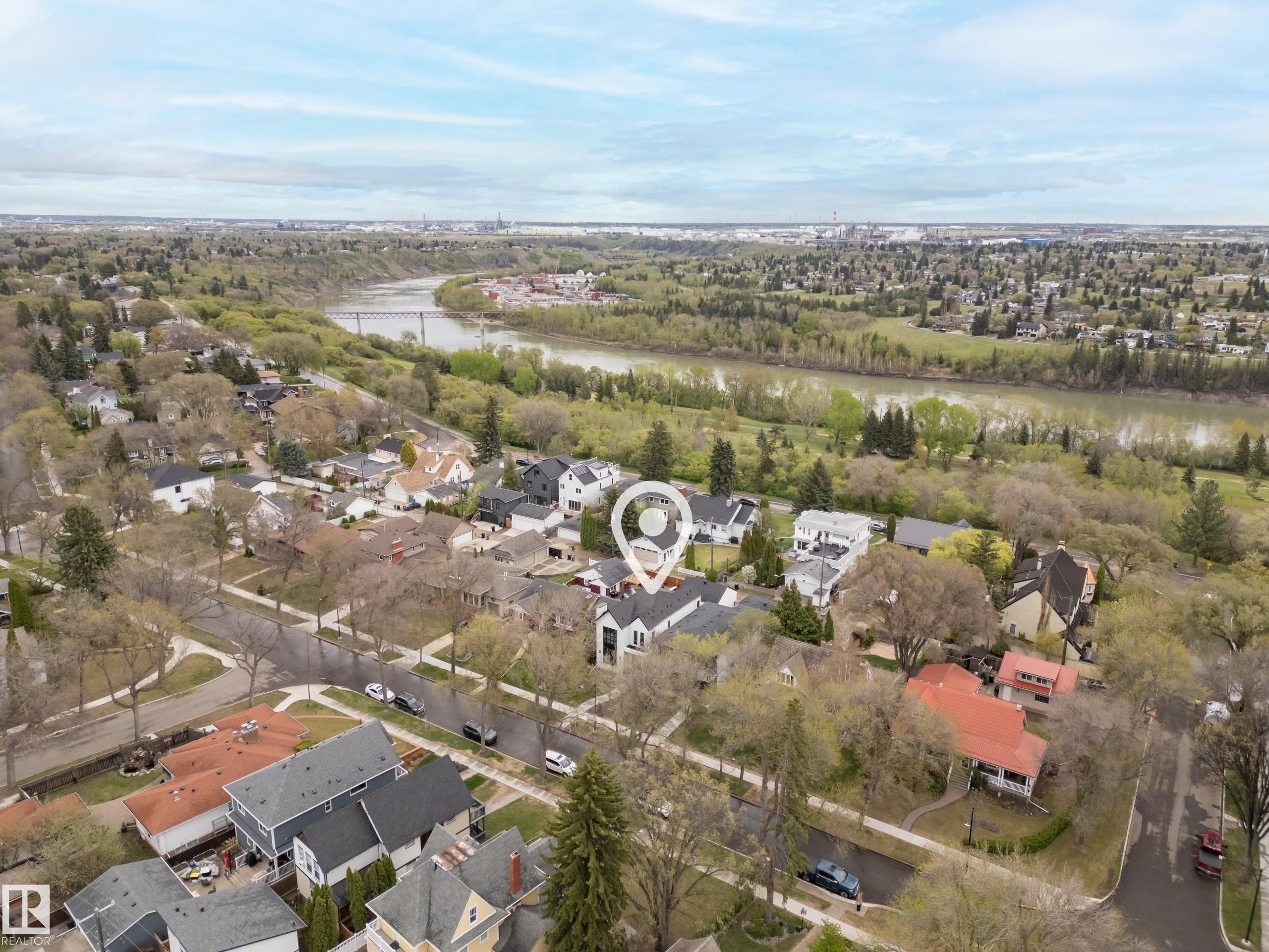 Aerial perspective showcasing a residential neighborhood with mature trees - 6115 111 Avenue, Edmonton, AB - Outdoor With View