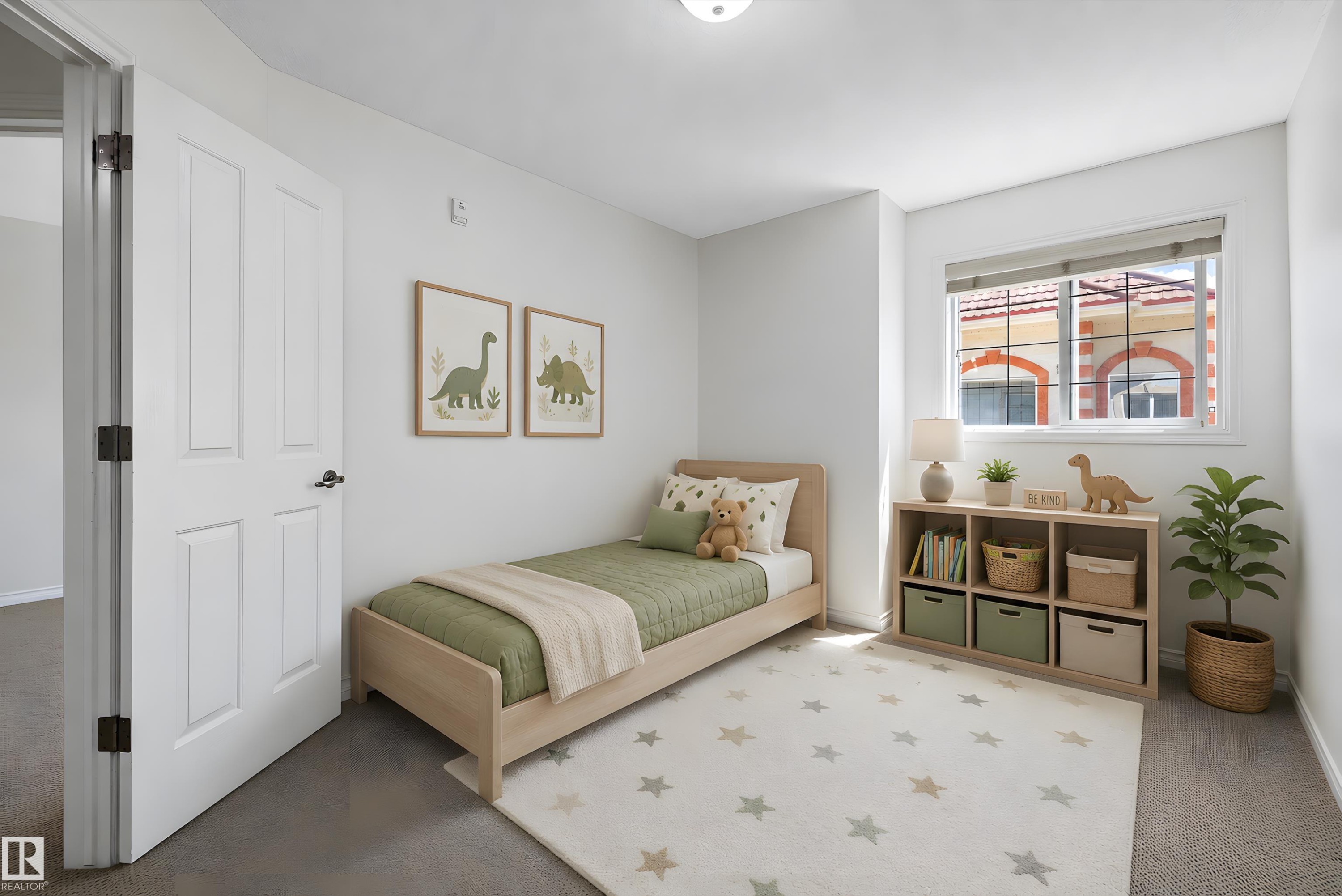 This room features a neutral color palette, recessed window, and a paneled interior door with dark hardware - 101 13825 155 Avenue, Edmonton, AB