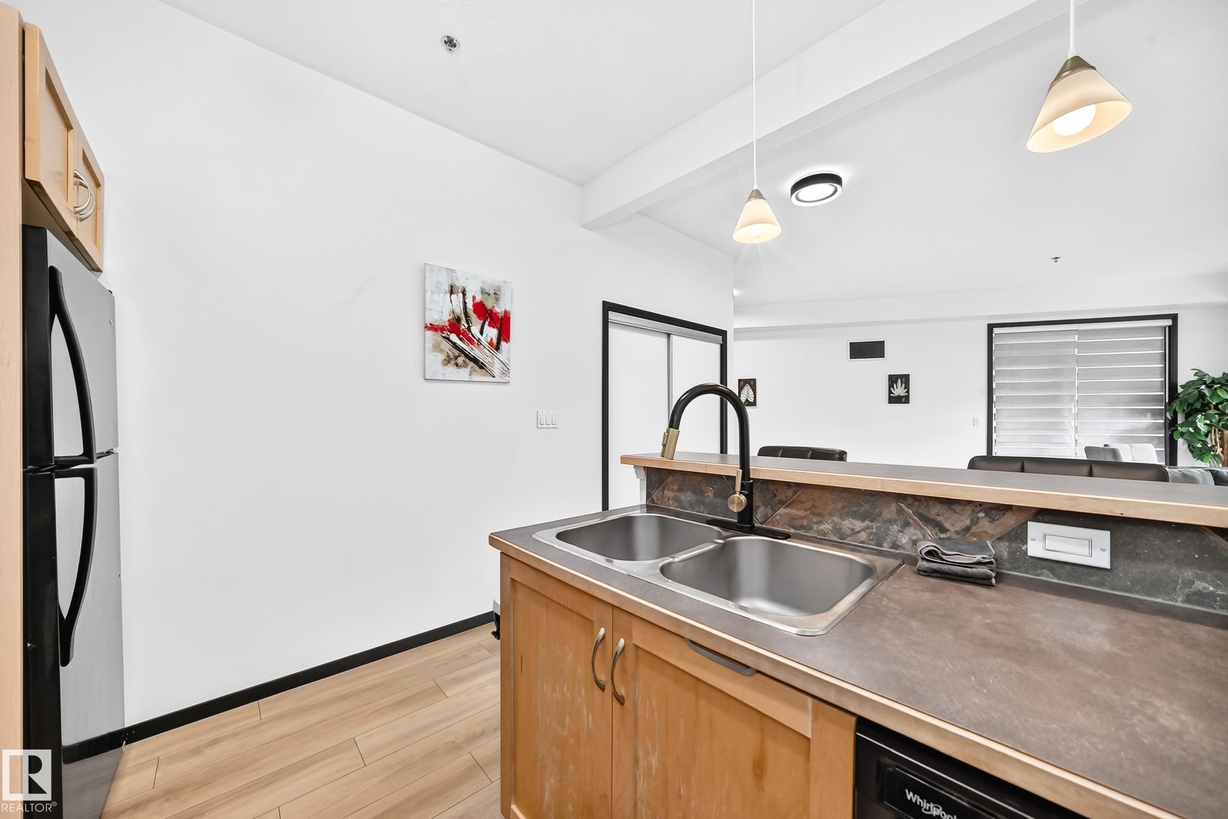 #226 4831 104A St Nw, Edmonton, AB - Indoor Photo Showing Kitchen With Double Sink